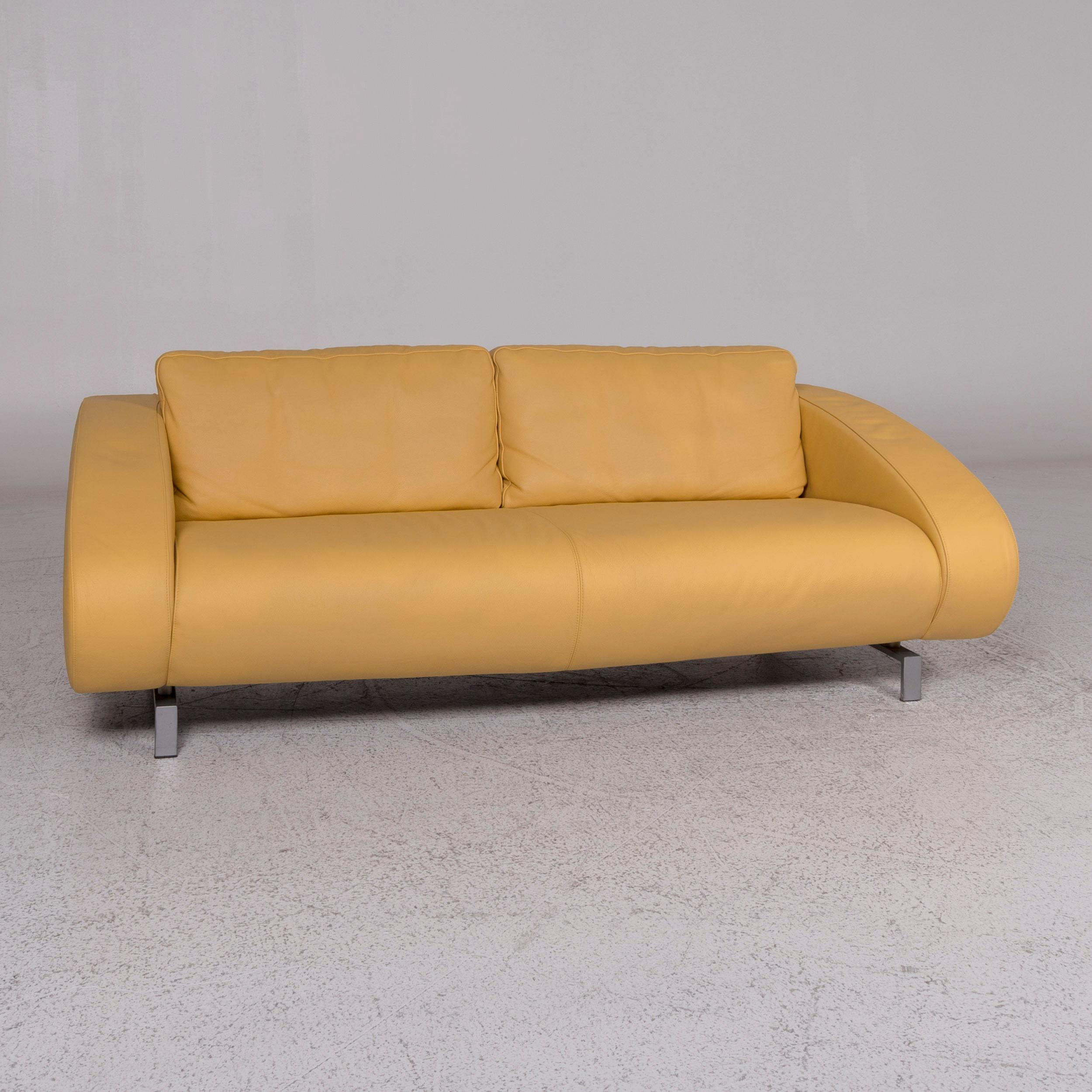 We bring to you a Machalke leather sofa yellow two-seat.
   
 
 Product measurements in centimeters:
 
 Depth 105
Width 185
Height 69
Seat-height 39
Rest-height 53
Seat-depth 53
Seat-width 147
Back-height 30.