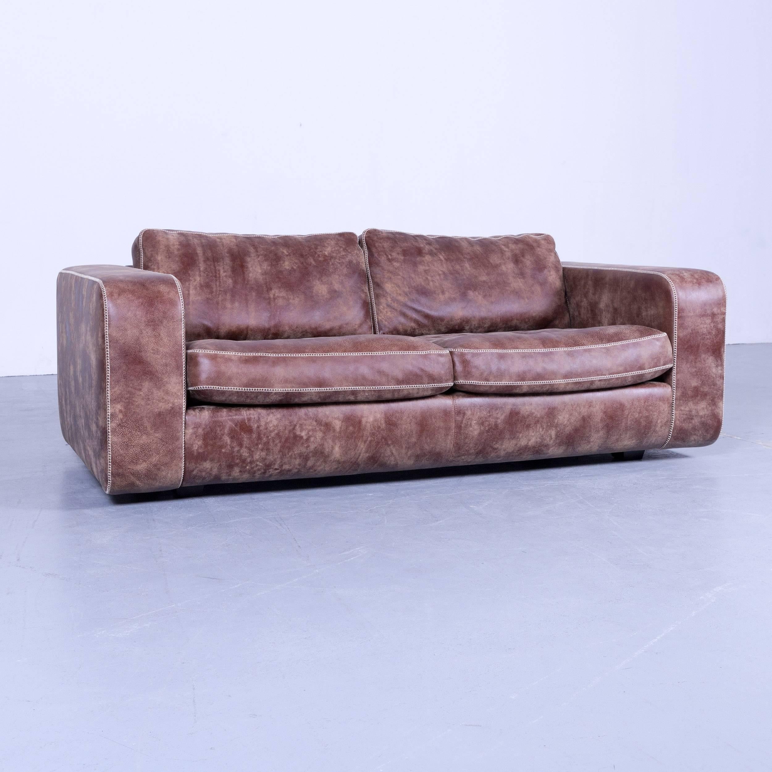 Brown colored original Machalke designer leather sofa in a minimalistic and modern design, made for pure comfort and flexibility.