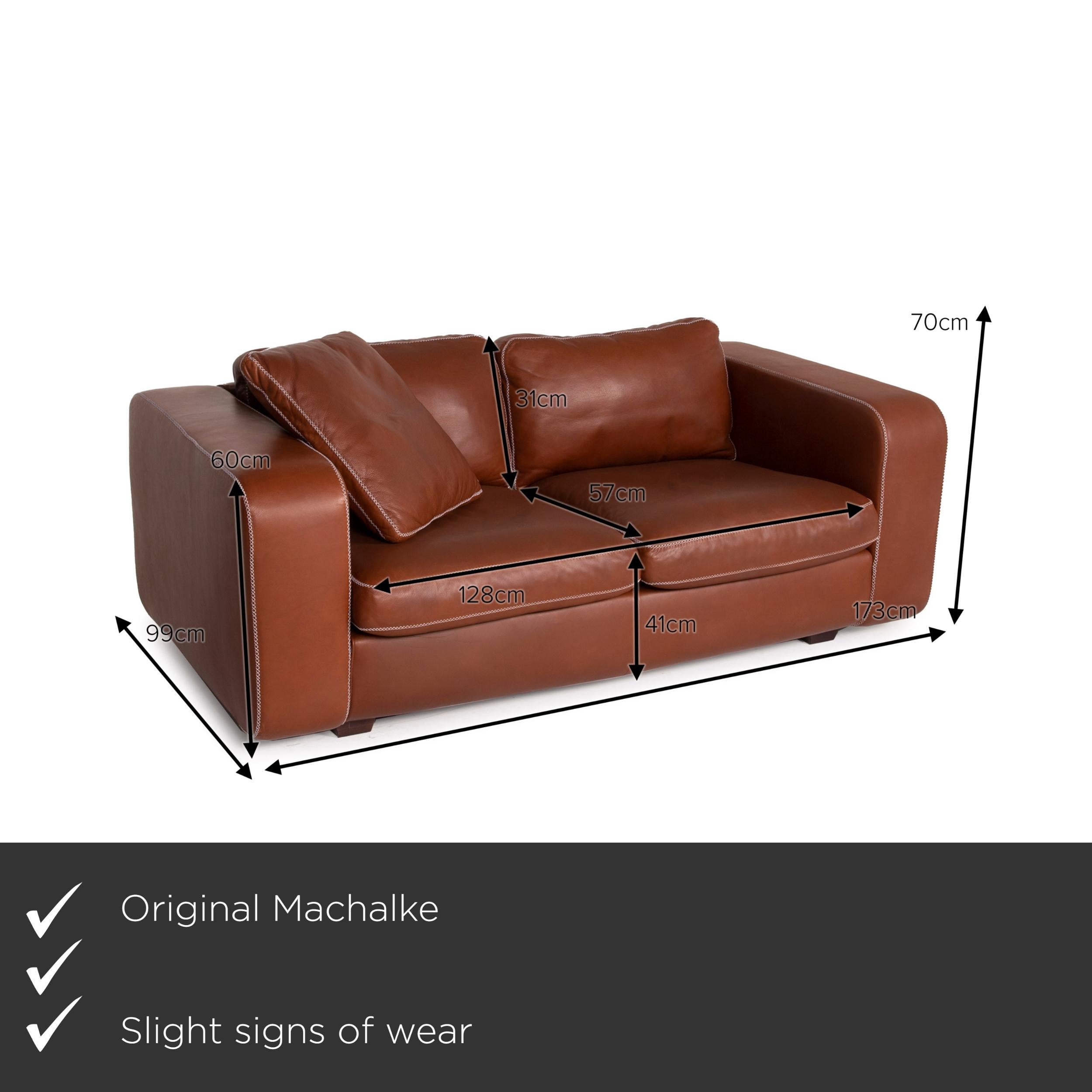 We present to you a Machalke Valentino leather sofa brown two-seater.

Product measurements in centimeters:

Depth 99
Width 173
Height 70
Seat height 41
Rest height 60
Seat depth 57
Seat width 128
Back height 31.
 
  
  