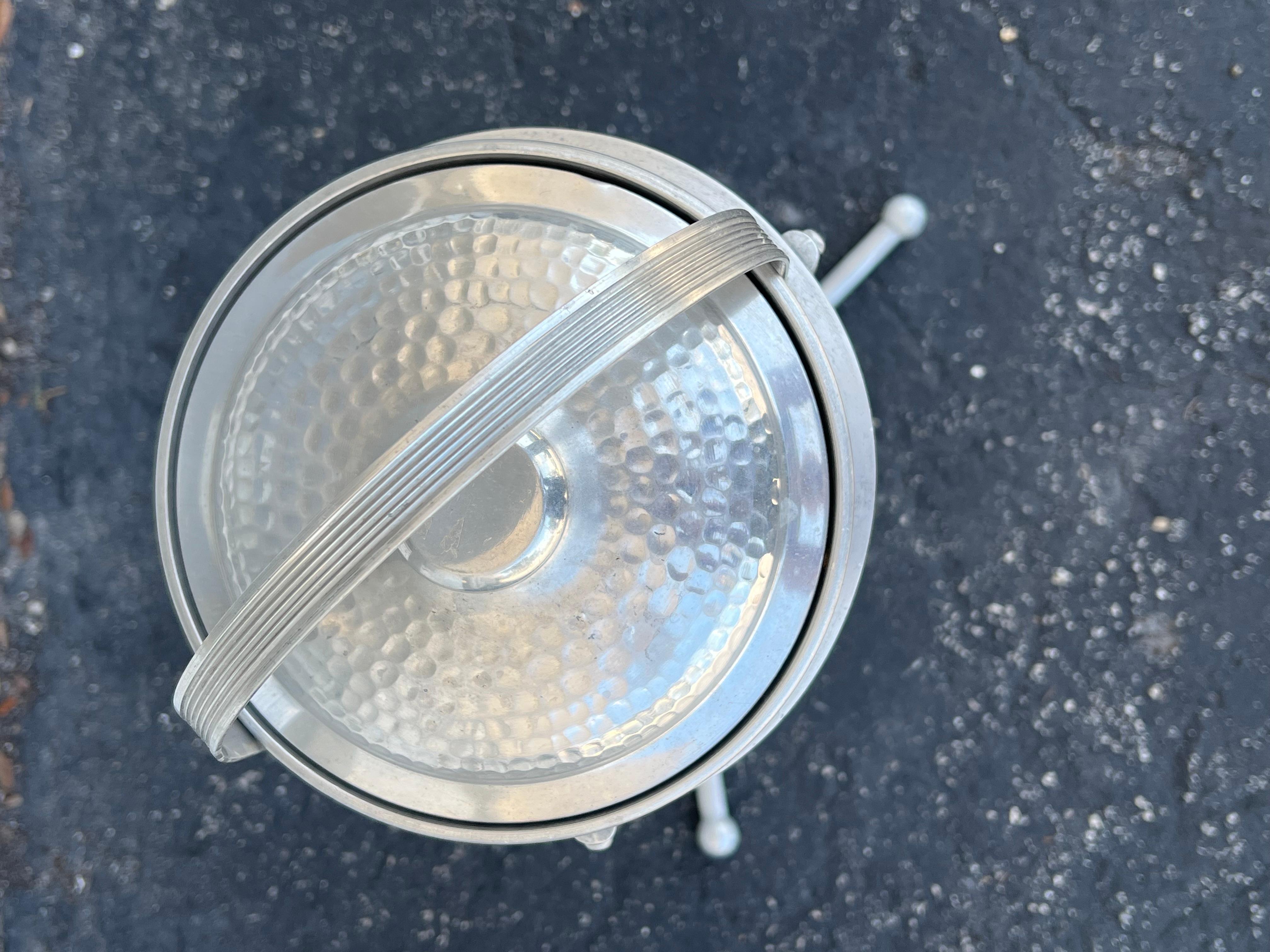 A great looking gueridon-ice bucket or planter stand, including an ice bucket. Machined aluminum with a great art deco/industrial style. Tripod base with solid aluminum balls. 