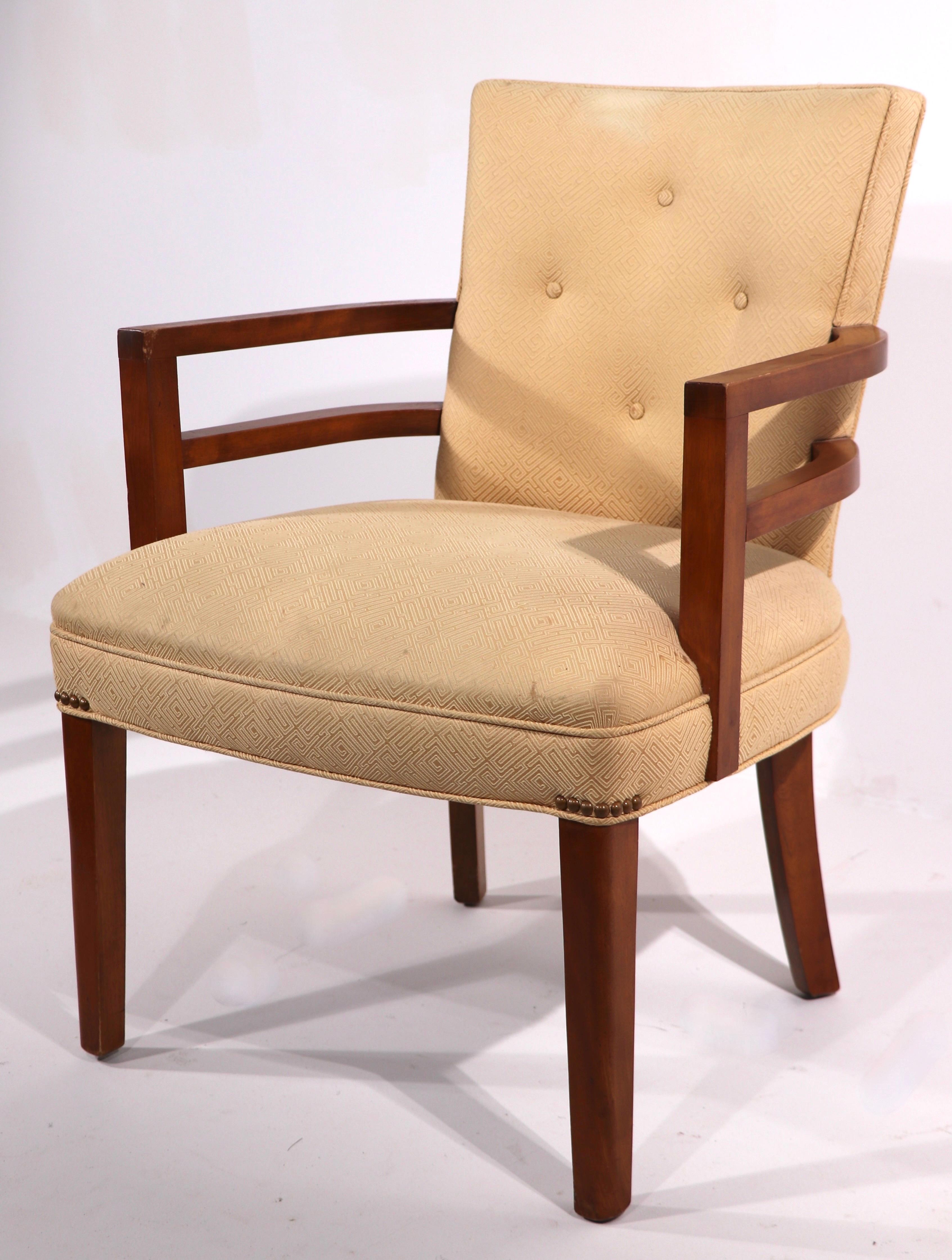 Classic Machine Age period arm chair, having speed band wrap around arms, upholstered back, and seat. This example is in very good, original condition, clean and ready to use, showing only light cosmetic wear, normal and consistent with