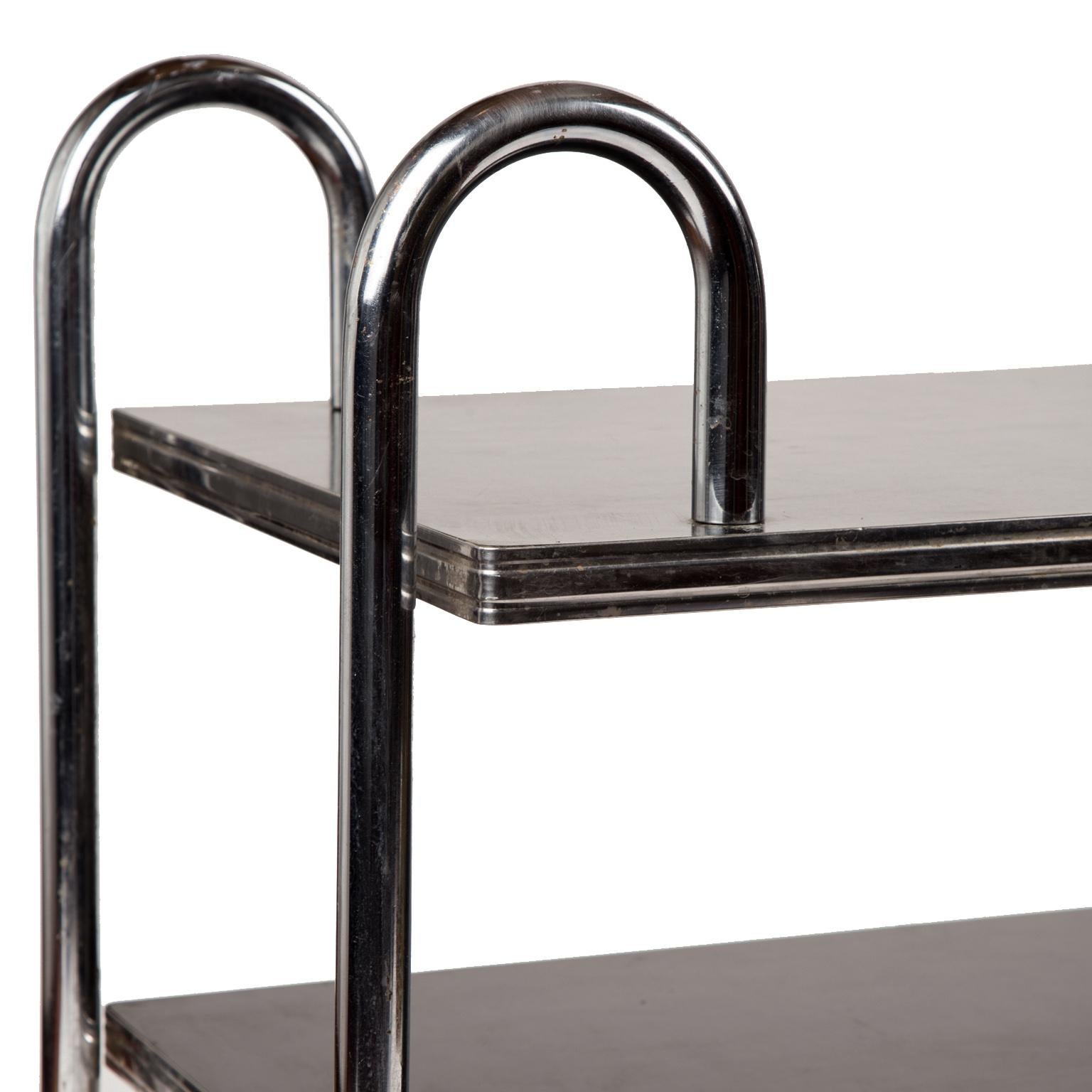 American Machine Age Art Deco Chrome Table by Doehler furniture in the manner of Rohde