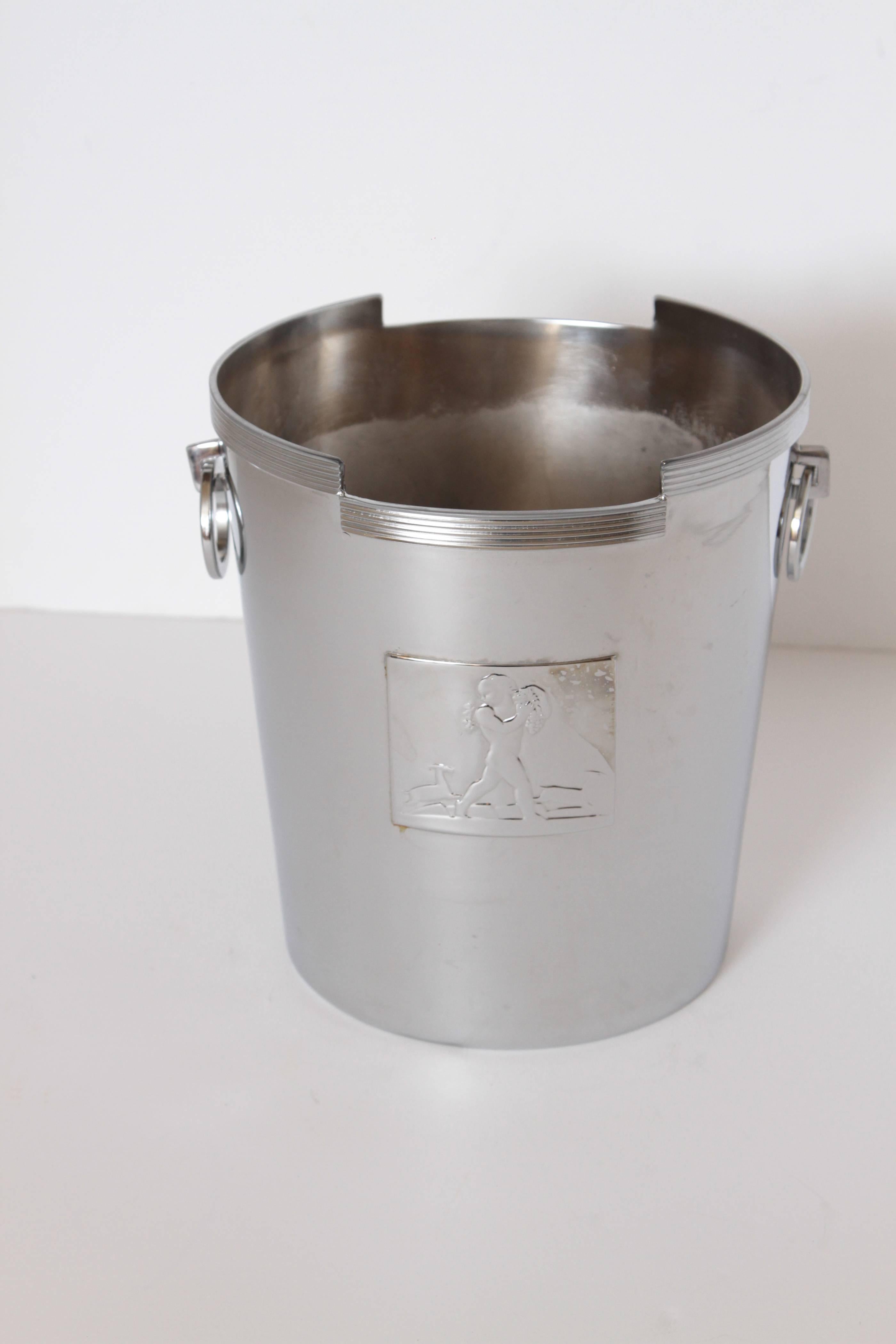 Machine Age Art Deco Rockwell Kent Chase Bacchus handled wine cooler / champagne bucket.   PRICE REDUCED

Bacchus high-relief panel designed by Kent, with initials R K visible. 
Incised line ornamentation, in the manner of Lurelle Guild, who also