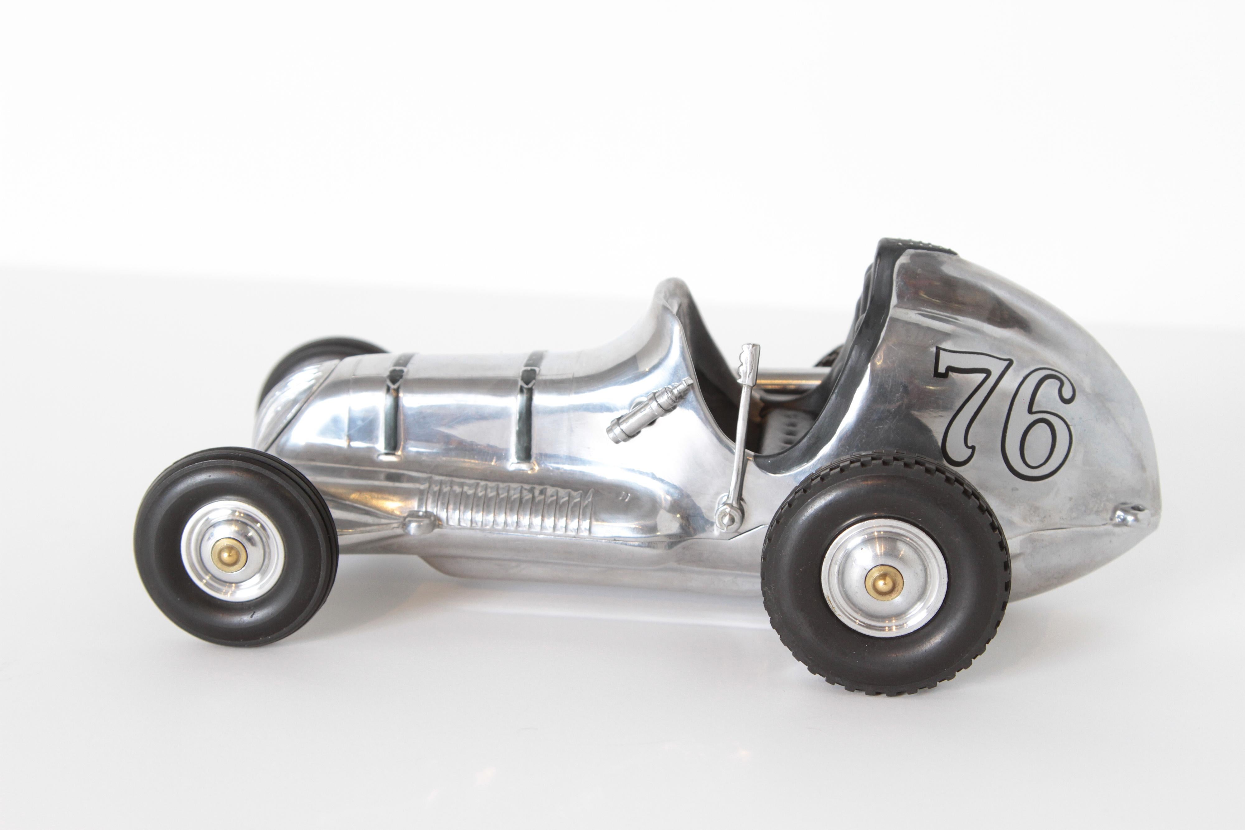 American Machine Age Art Deco Roy Cox Thimbledrome Polished Aluminium Tether / Push Car For Sale