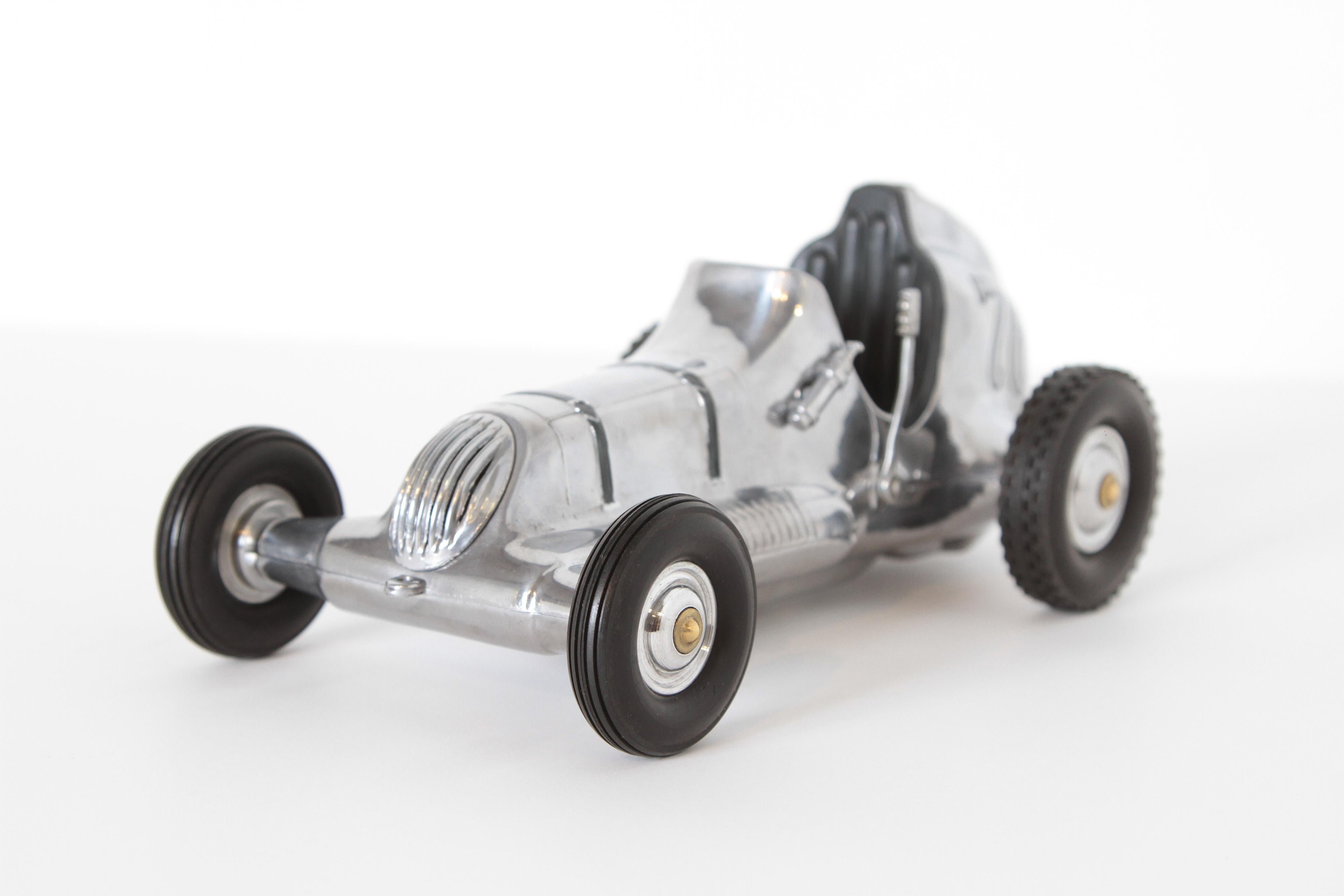 Machine Age Art Deco Roy Cox Thimbledrome Polished Aluminium Tether / Push Car In Good Condition For Sale In Dallas, TX
