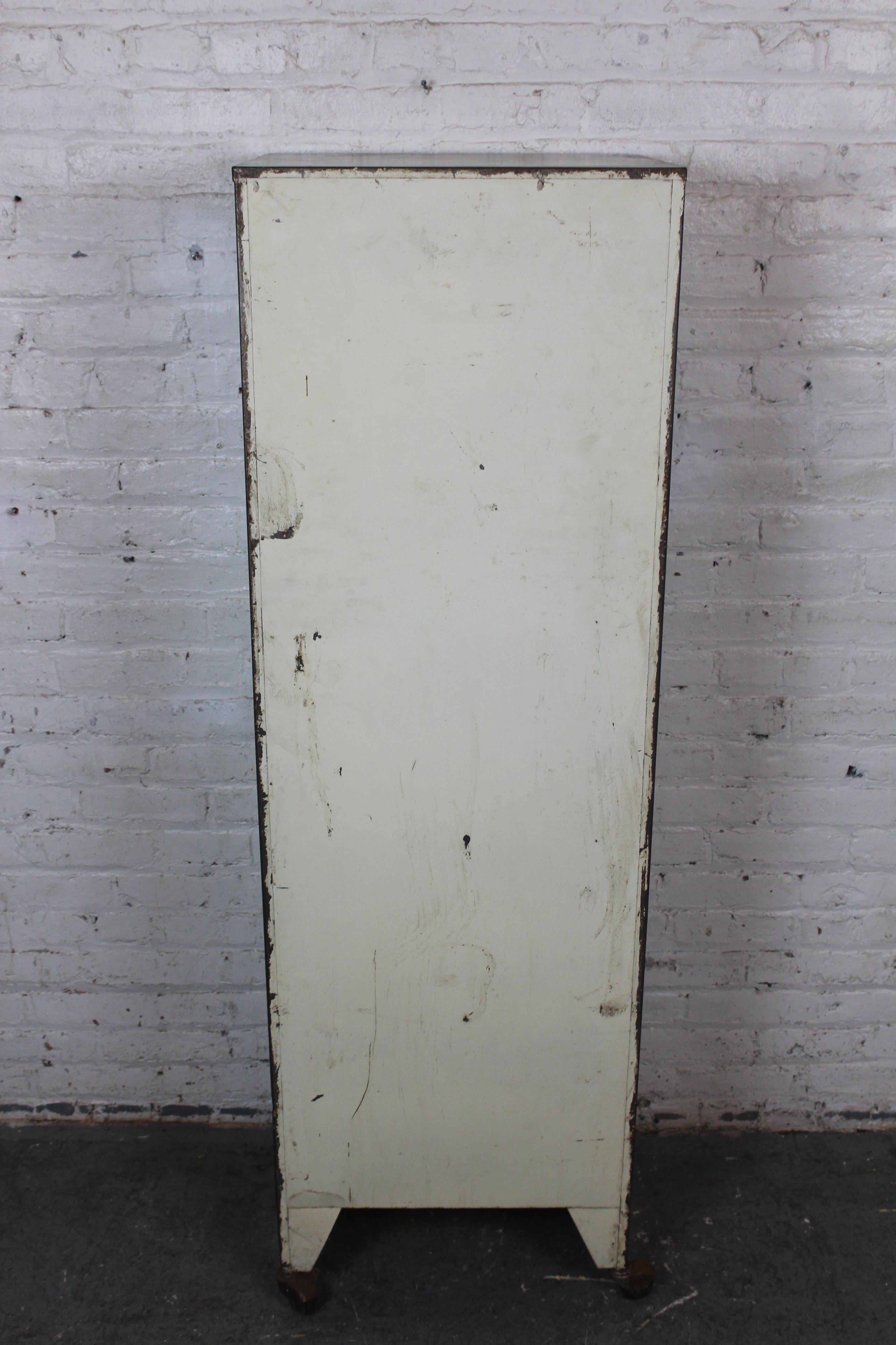 Machine Age Industrial Metal Medical Cabinet In Good Condition For Sale In Brooklyn, NY
