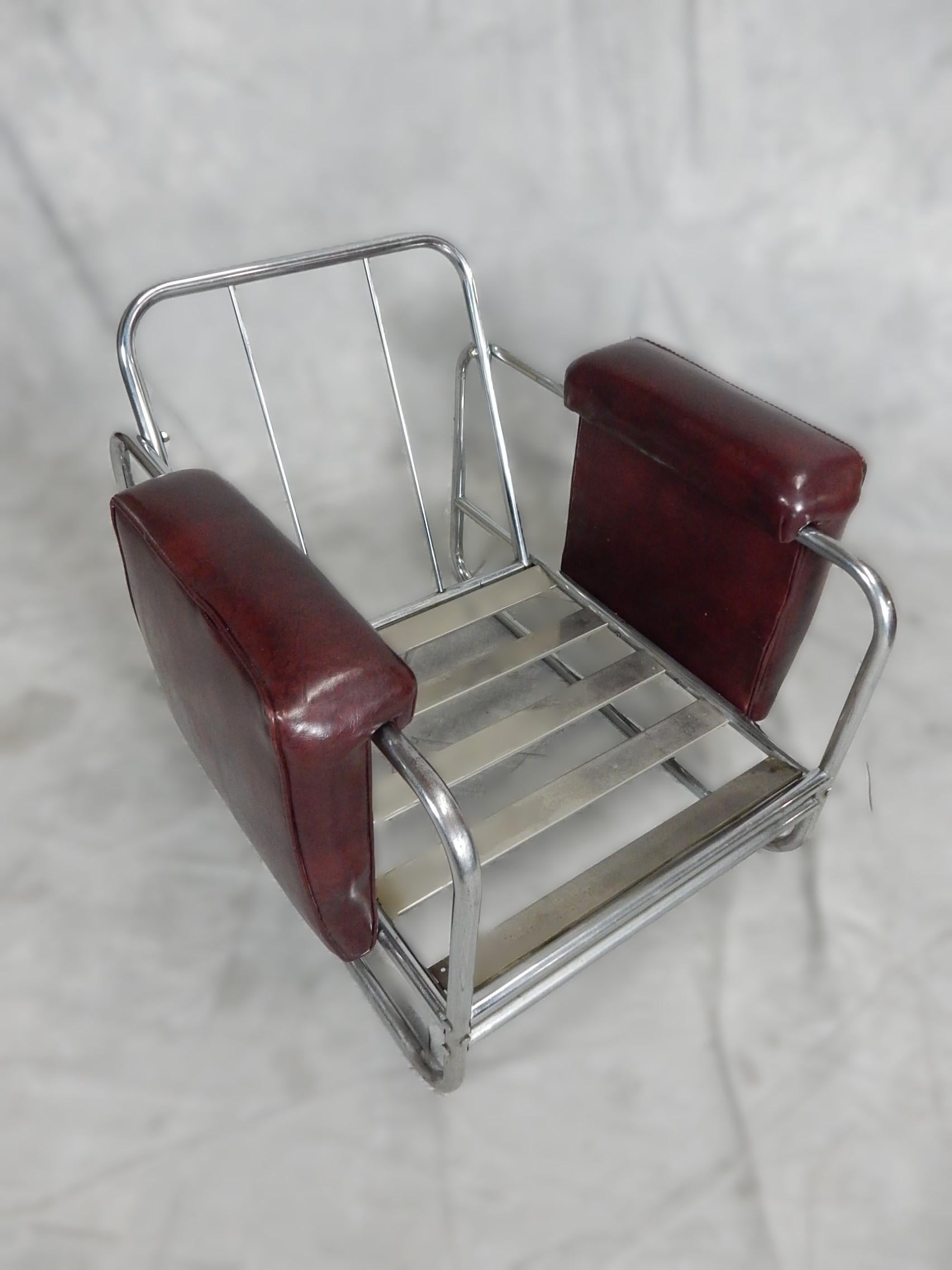 Machine age Industrial Nickel Plated Steel Lounge Chairs In Fair Condition For Sale In Las Vegas, NV