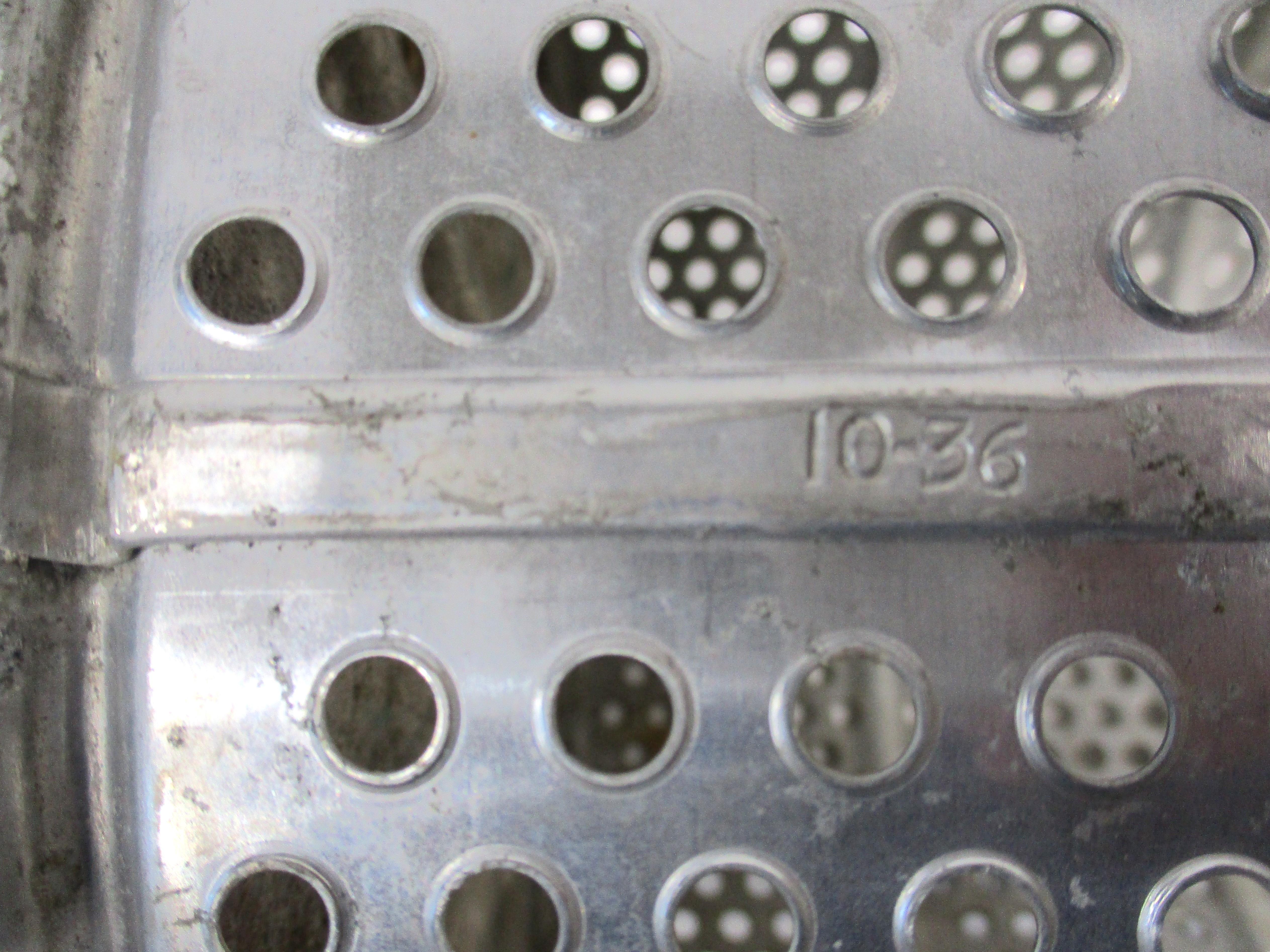 Machine Age Perforated Metal Wastebasket  1