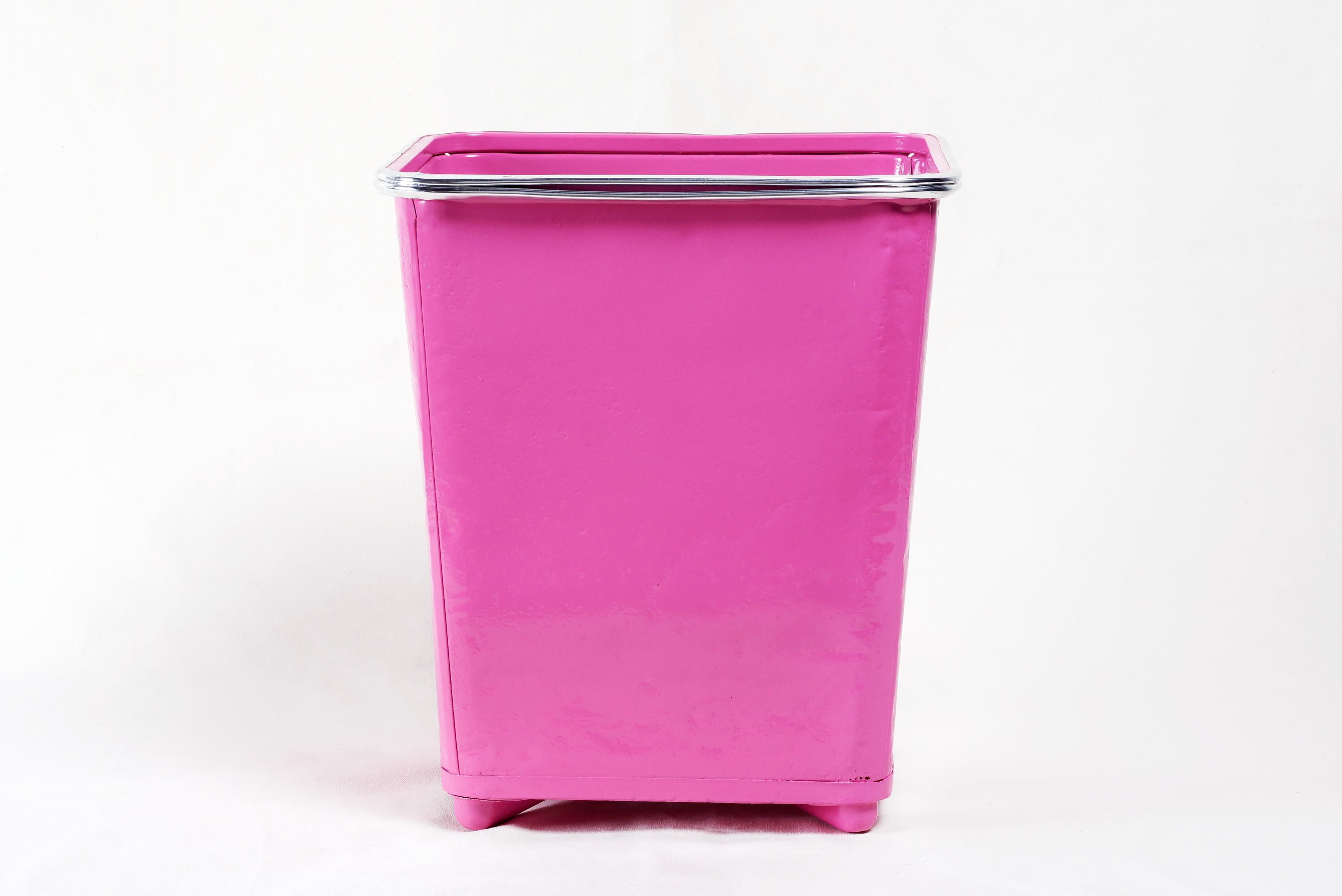 Excellent 1940s steel trash can with polished aluminium trim. Refinished in a gloss pink powder coat. Square shape with steel feet that lift it slightly off the ground. Please note gentle dents to vintage steel and small perforations on the bottom