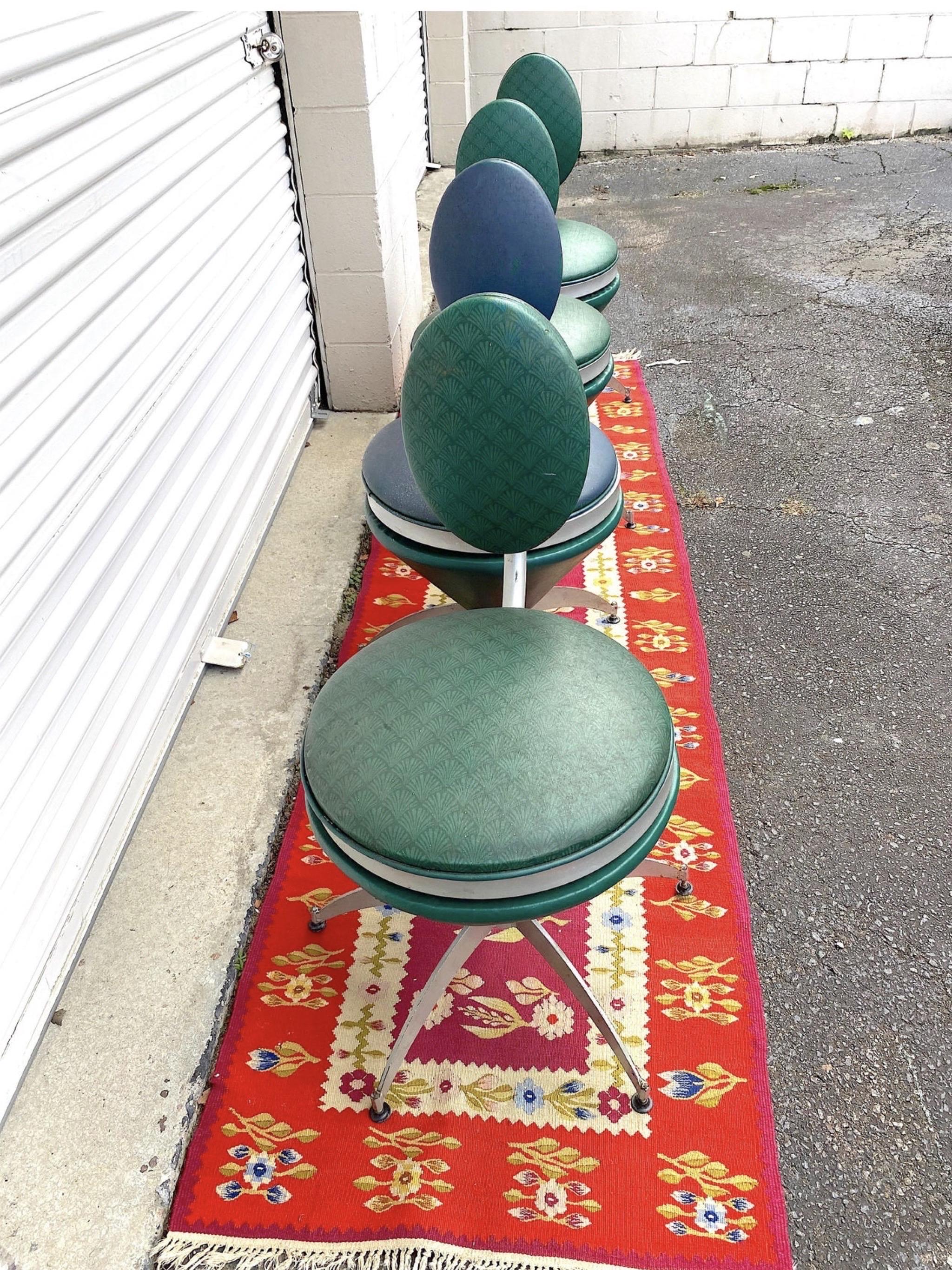 A super funky set of 4 Verner Panton style chairs. Original Art Deco/machine age style with classic Art Deco upholstery. They still swivel 360 degrees but they do show signs of wear at the bases - but still sturdy as ever! The round seats sit on 5