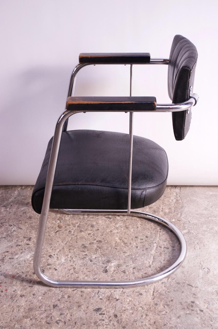 Ebonized Machine Age Tubular Chrome and Leather Cantilevered Armchair For Sale