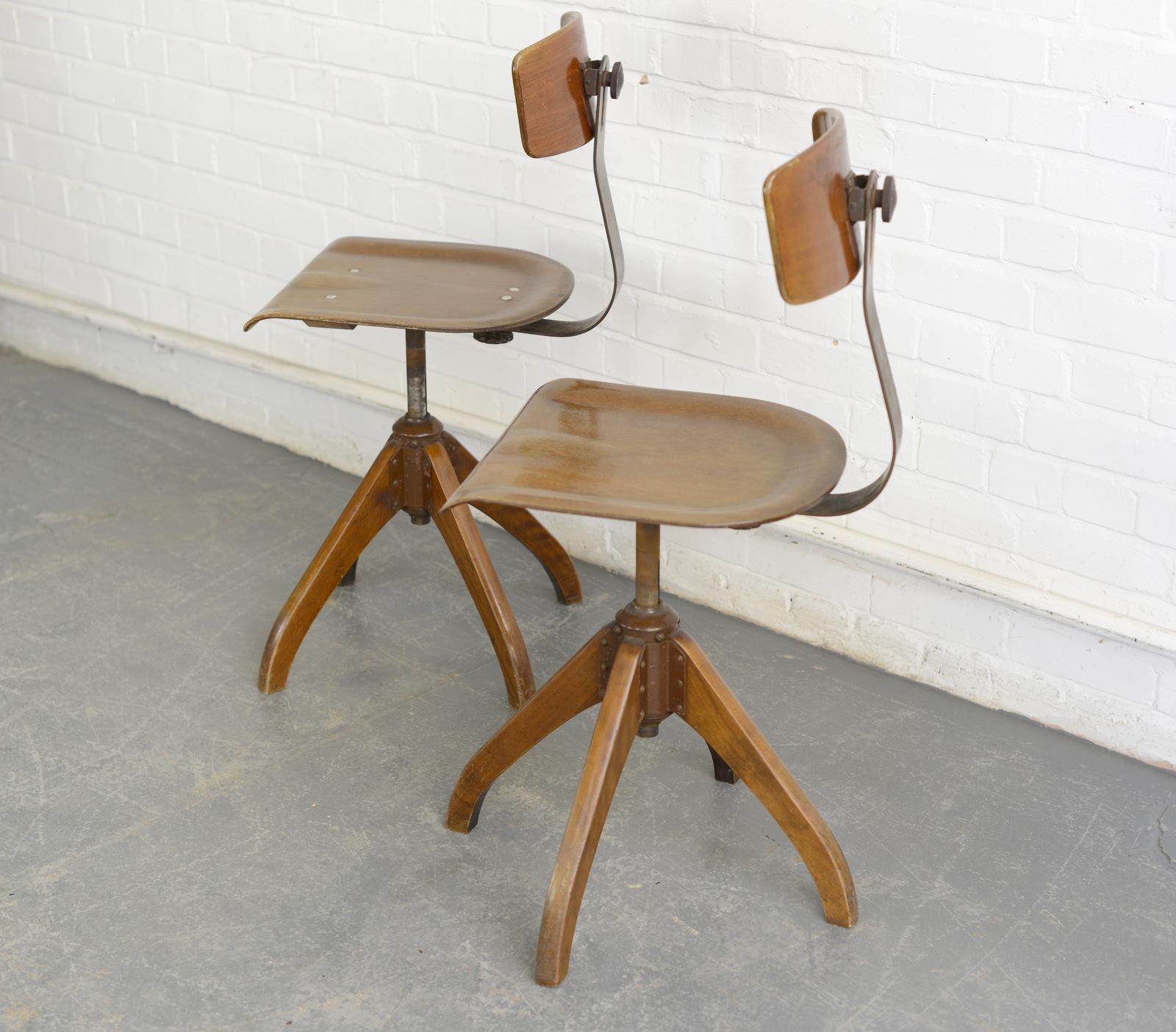 Machinists chairs by Ama Elastik, circa 1930s.

- Price is per chair 
- Sprung seat and backrest
- Height adjustable
- Beech seat and backrest
- Each chair is marked with the DRGM stamp
- German, circa 1930s.
- Measures: 39cm wide x 43cm