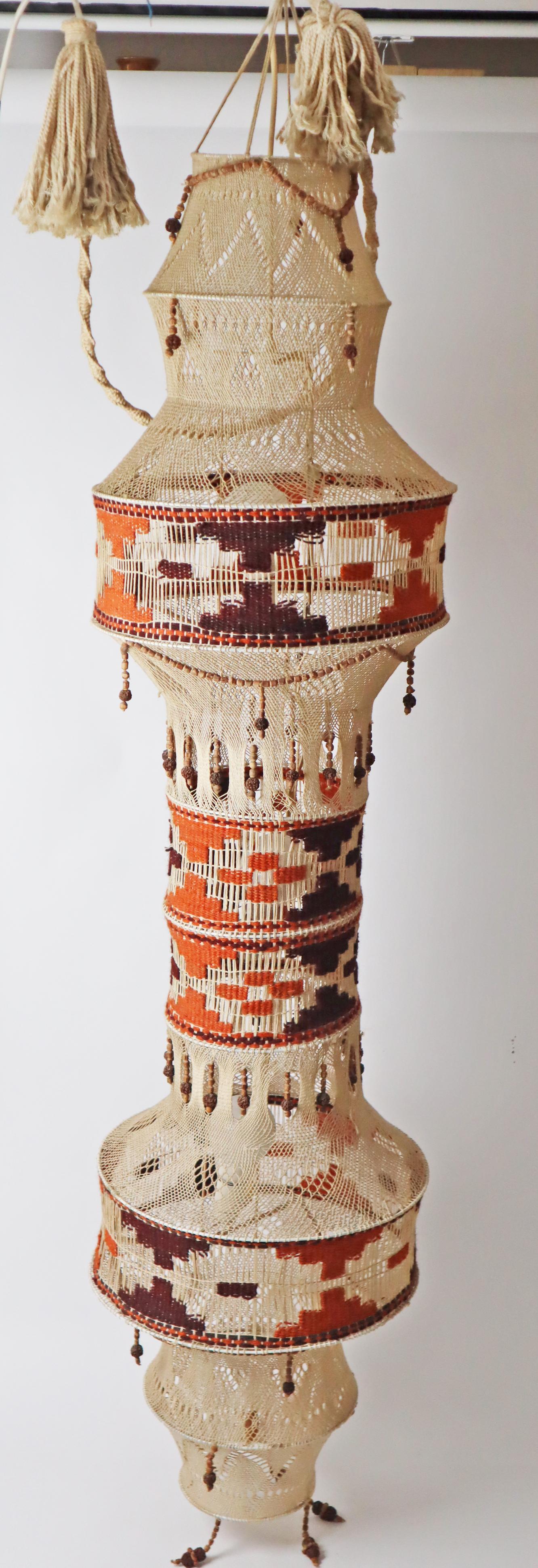 Rarely large hanging lamp ideal for a staircase. The total length with the elaborately braided cable is 340 cm and is therefore ideal for particularly high rooms. Of course, you can also hang this lamp in other rooms if you do not use the cable or