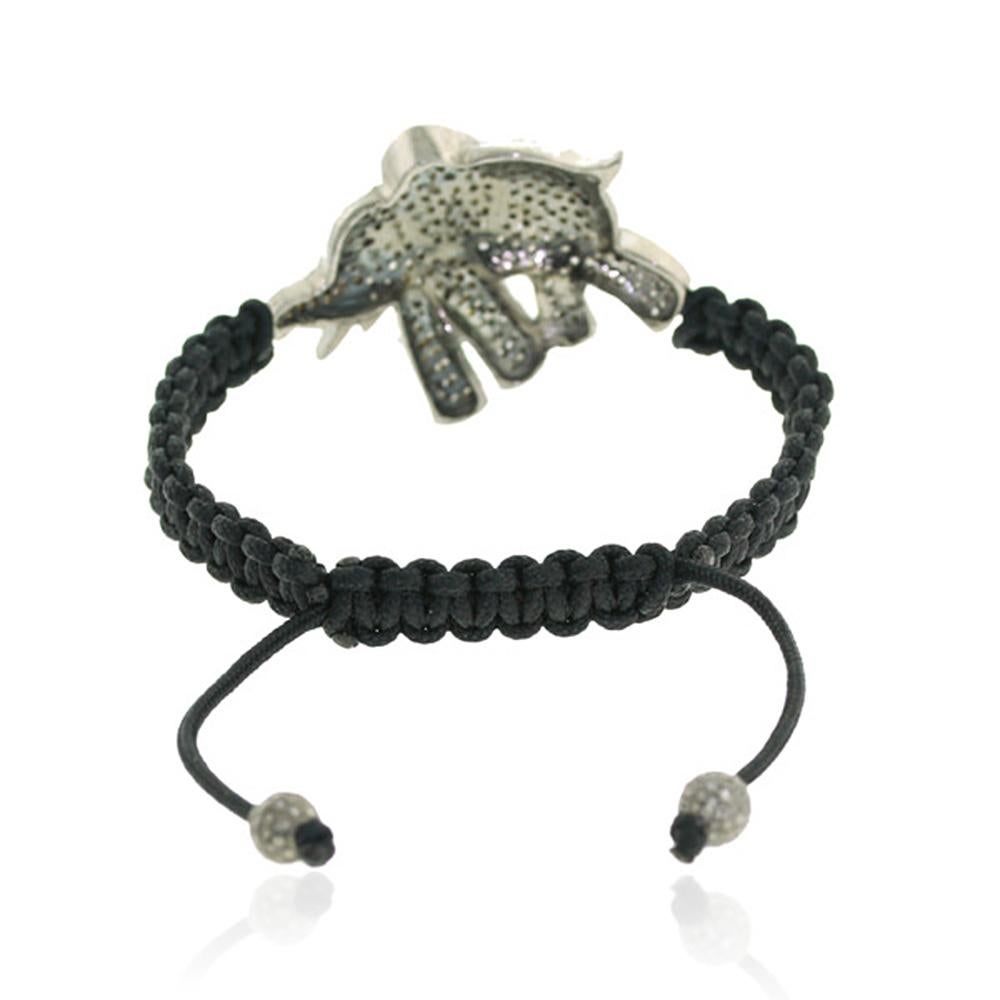Bracciale con diamanti a forma di elefante realizzato a mano in argento sterling, con 3,69 carati di diamanti e .02 carati di rubini. 

SEGUI  Visita la vetrina di Meghna Jewels per vedere l'ultima collezione e i pezzi esclusivi.  Meghna Jewels è