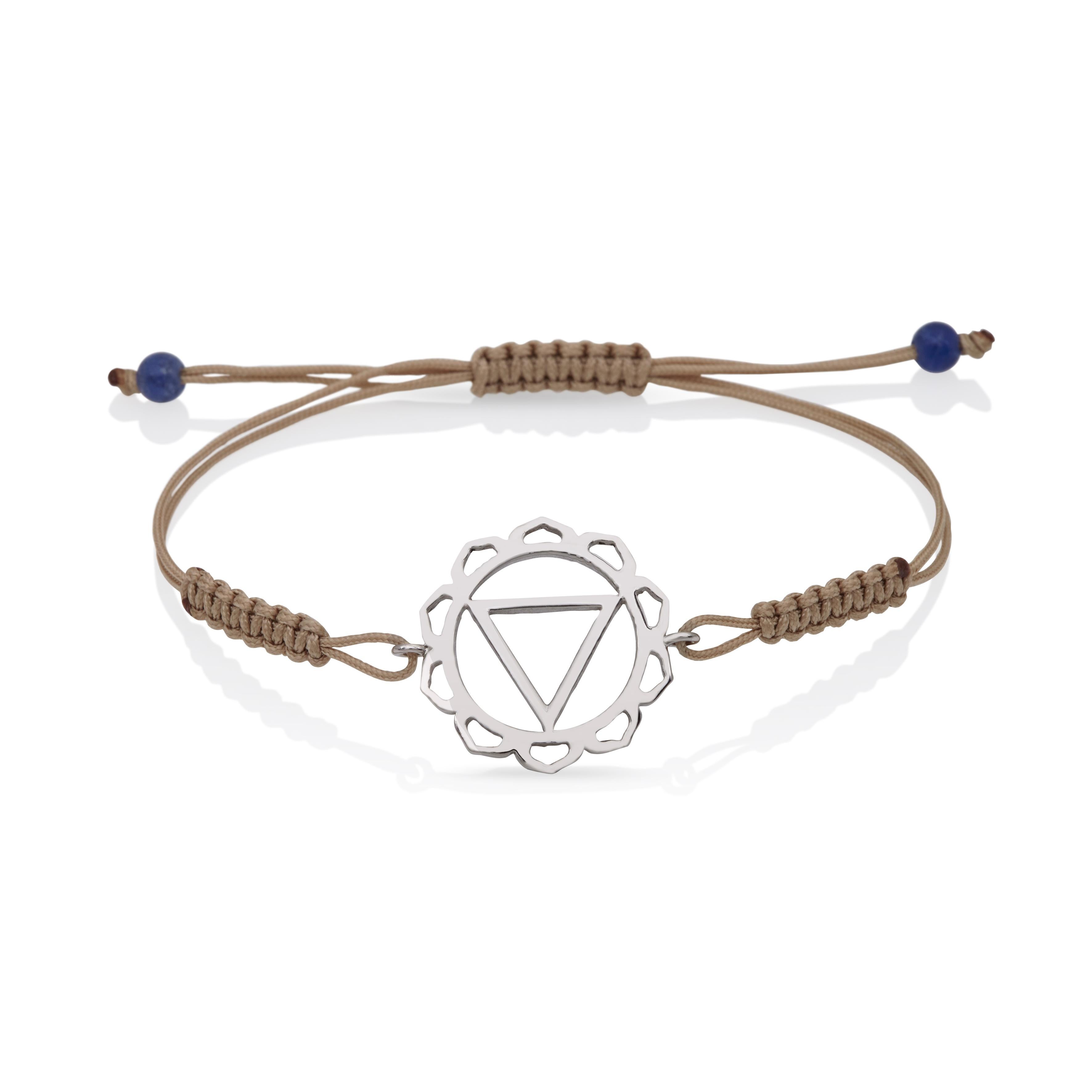 Macrame Yoga Bracelet with  Manipura,the Solar Plexus Chakra in 14Kt White Gold with Brown Cord and Lapiz lazuli beads
A very beautiful and wearable macrame bracelet made of 14Kt Gold with the Manipura - Solar Plexus Chakra. It will match with