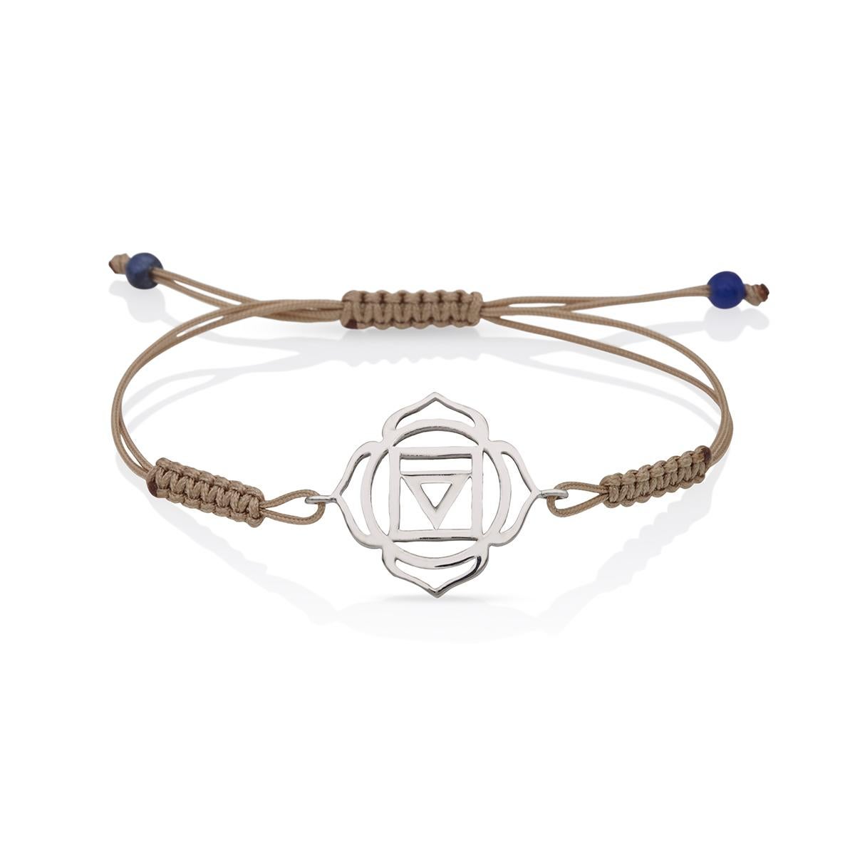 Macrame brown Cord Yoga Bracelet with the Muladhara Root Chakra in 14 Kt white Gold with Lapis Lazuli .
A very beautiful and wearable macrame bracelet made of 14Kt white Gold with the Muladhara Chakra. It will match with everything in your closet.