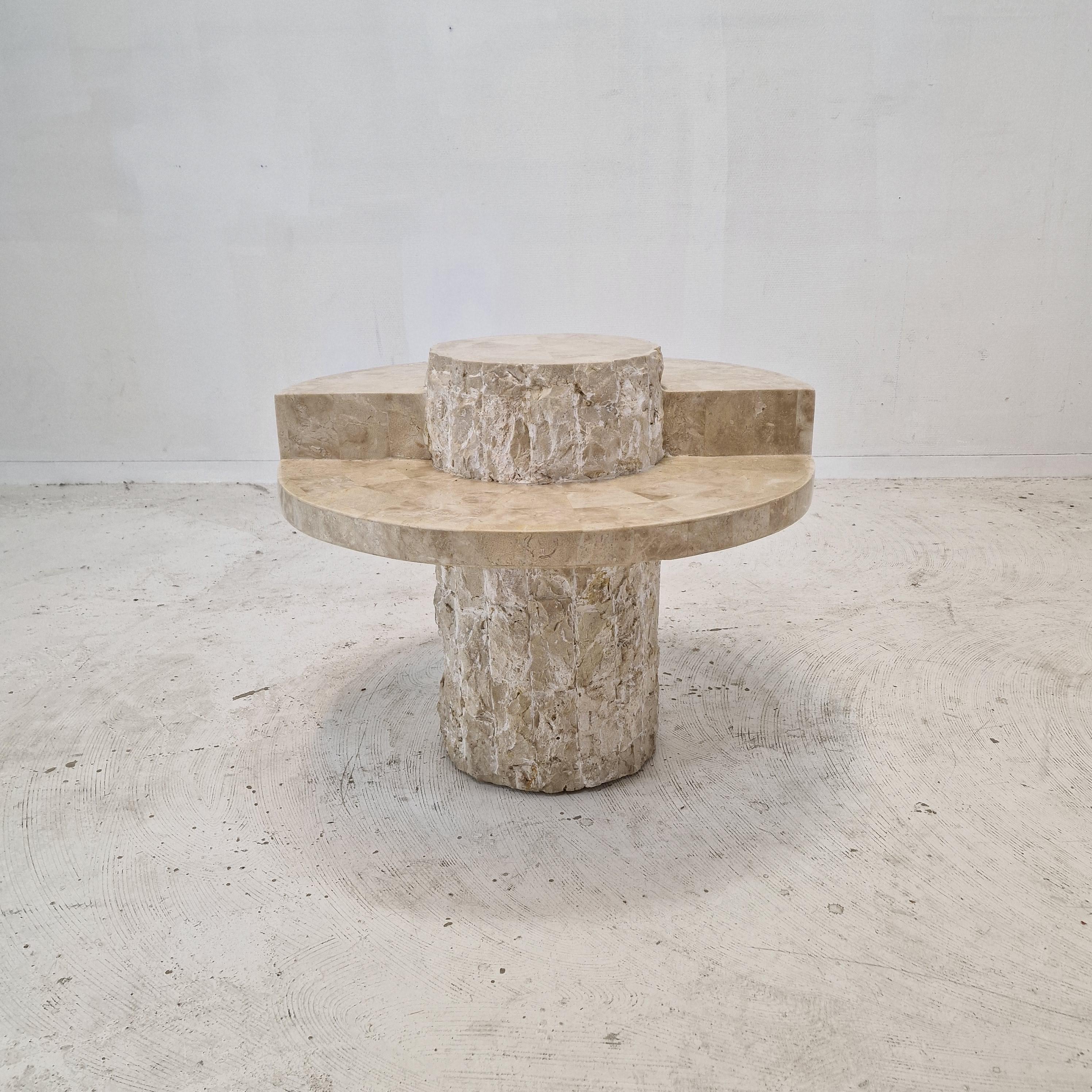 Very cute coffee or side table, fabricated in the 80's.
In this size it is very hard to find.

This stunning table is made of polished edged Mactan stone or Fossil stone.
The weight is around 15 kg (55 lbs).

Please take notice of the beautiful