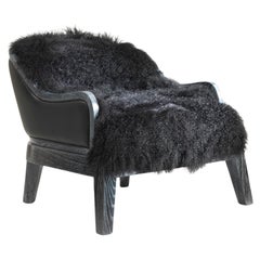 Madama black lamb fur wooden low armchair in oak
