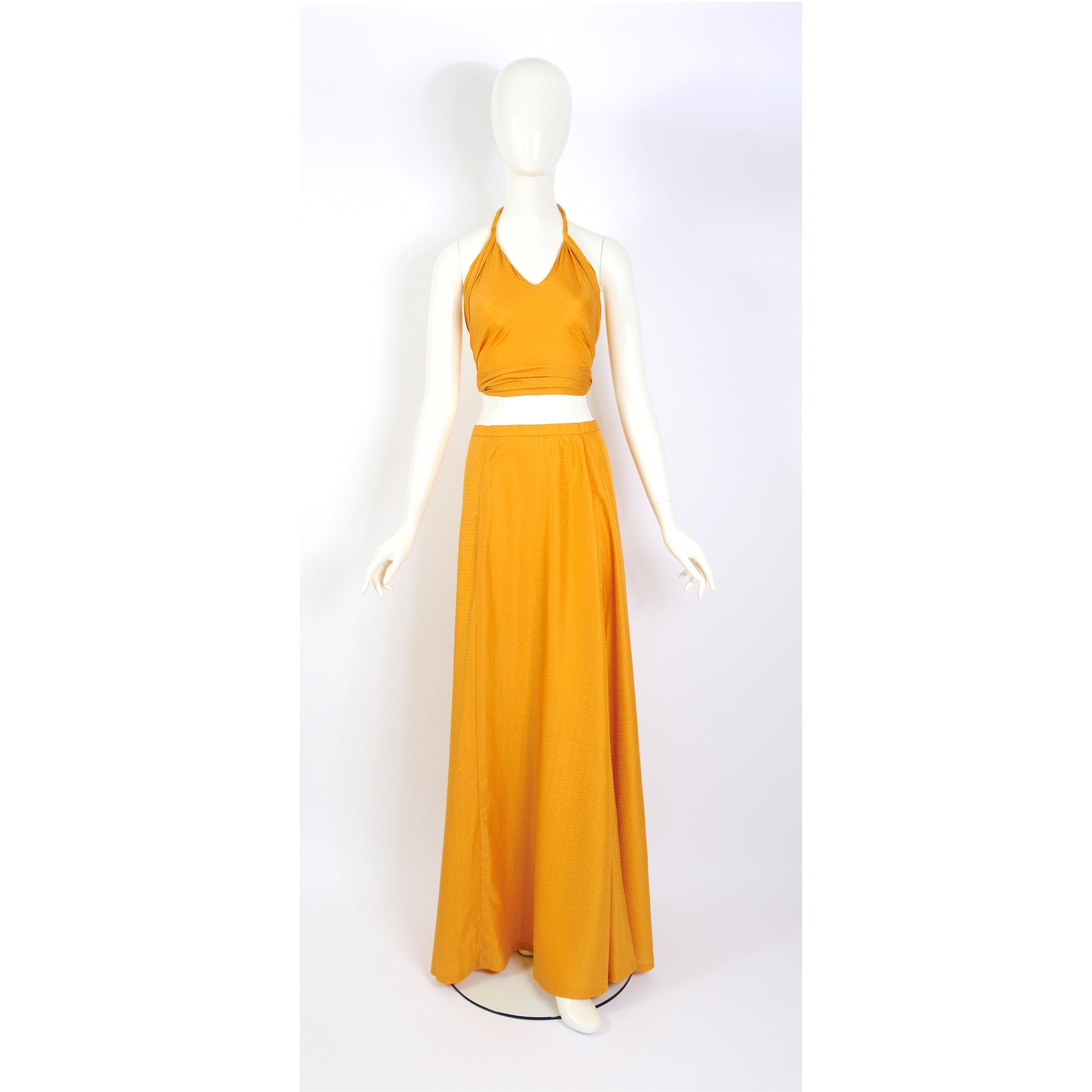 Madame Grès who demanded the finest quality and attention to detail had to take the step toward ready-to-wear clothing in the 1970s.....
Unworn with Tag - Stunning 1970s Boutique Grès by Madame Grès (Alix Barton) gold scarf 100% silk halter top &