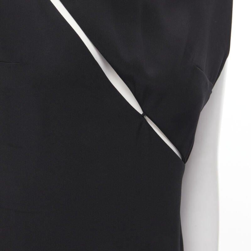 MADAME GRES Alta Costura París 1972 Vestido recortado de crepé negro M
Referencia: CRTI/A00404
Marca: Gres
Color: Negro
Patrón: Sólido
Cierre: cremallera
Detalles adicionales: Botones a presión en el hombro.Cierre de cremallera lateral. Detalle