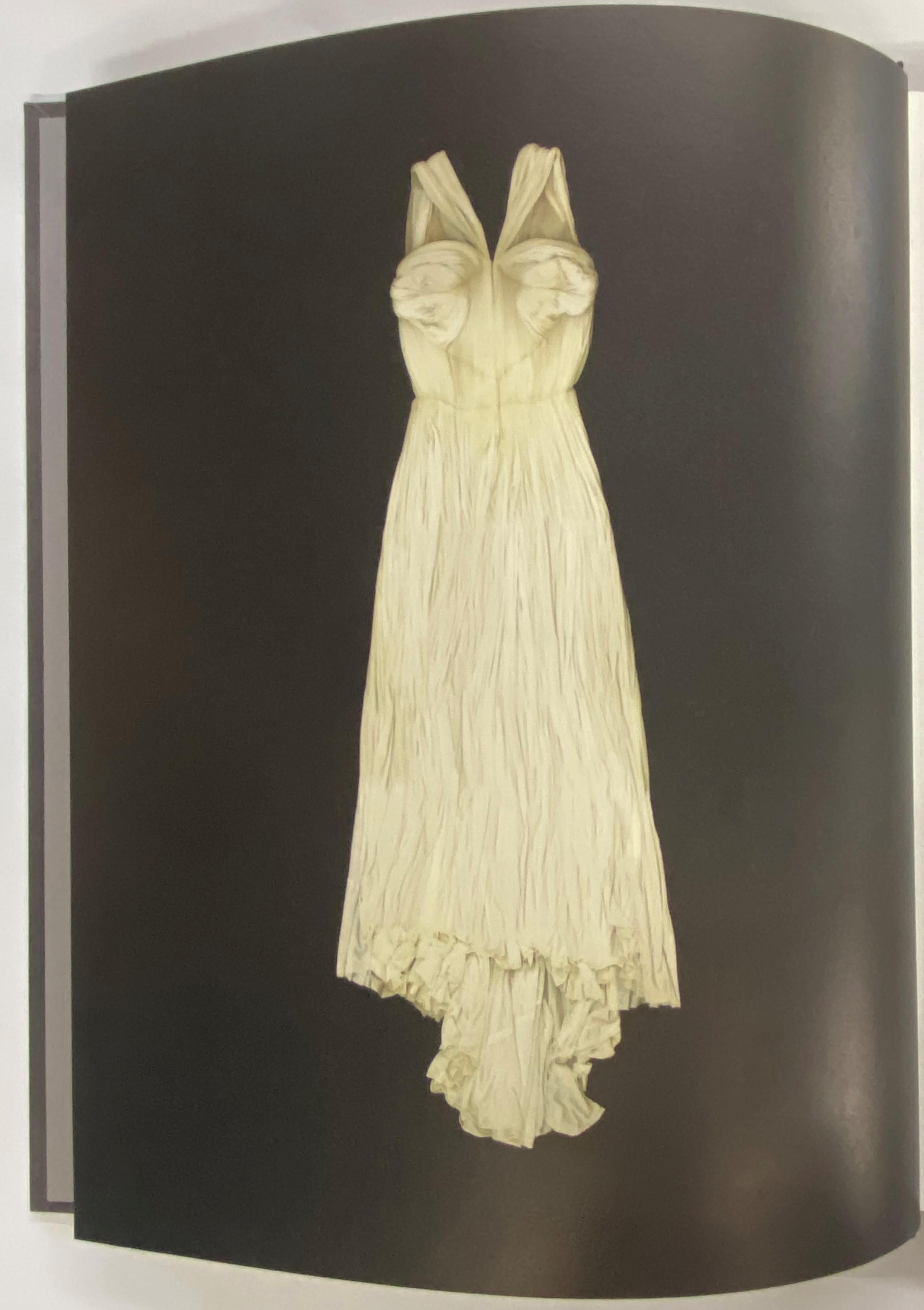 Accompanies an exhibition at the MoMu Fashion Museum, Province of Antwerp from September - February 2013
A remarkable couturier, with a career spanning half a century, Madame Alix Grès (1903-1993) was known for using delicate pleats which turned