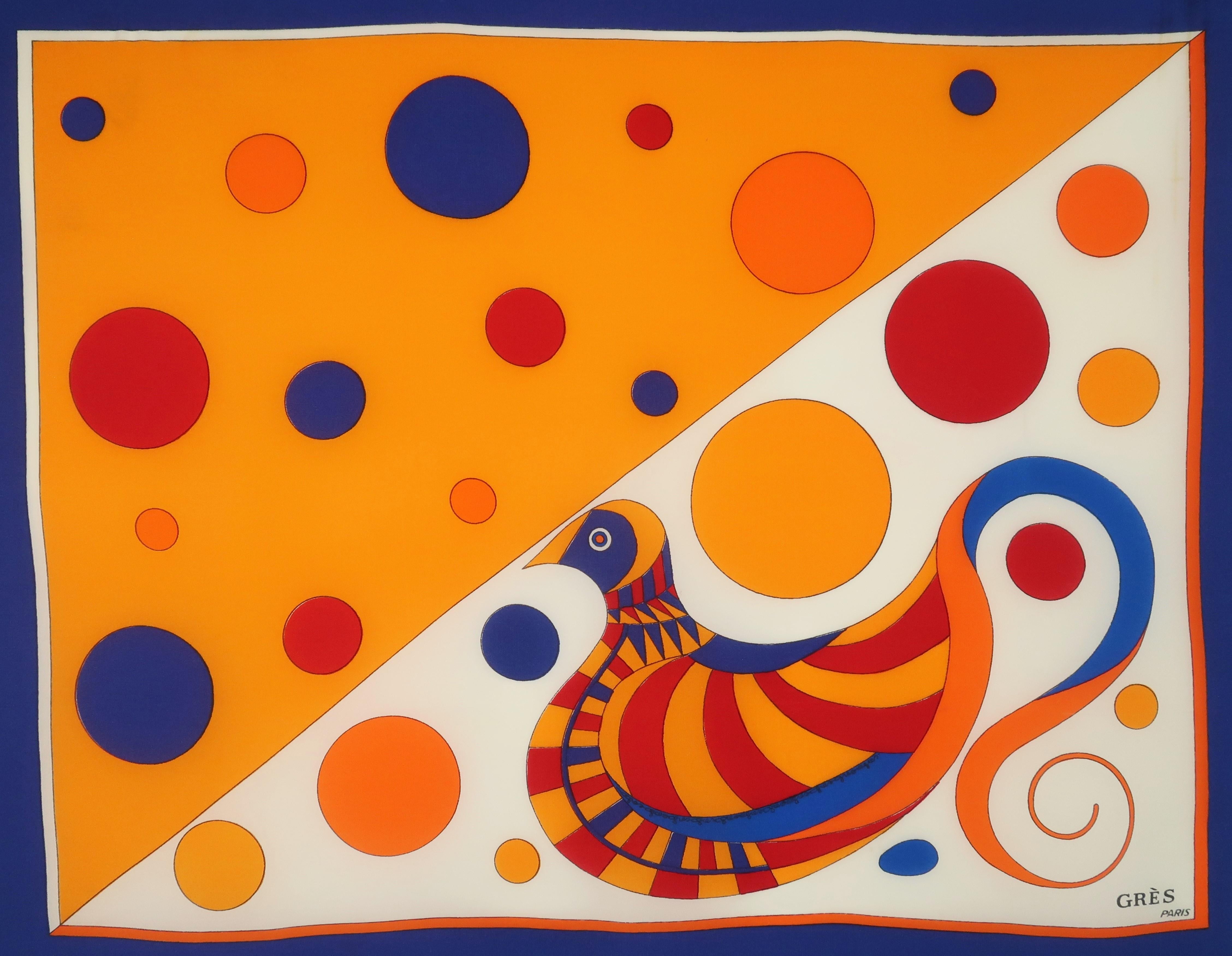 Late 1960's or early 1970's Madame Grès silk scarf with wonderful graphics in shades of yellow, blue and red depicting a bird and floating polka dots in the style of Alexander Calder.  Made in France and large enough for an accessory to wear at the