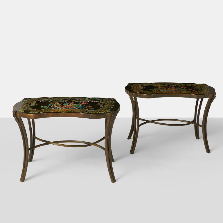 A pair of “Madame Pompadour” end tables by Philip and Kelvin LaVerne, each with an anodized aluminum top with floral bouquets. Etched signature to top of each example: [Philip + Kelvin LaVerne]. Signed with paper manufacturer’s label to underside of