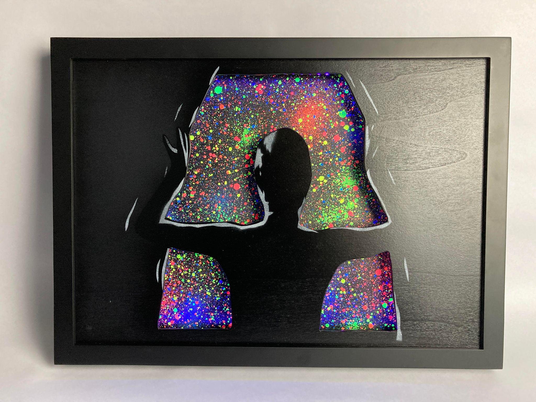 Edition version – cola grey and black background with fluorescent space splatter insert.
Surface – customized light up - wood panel in a frame
Edition size – AP
Size – panel - 16.5x11.7”/ framed 17.7x12.9” approximately 
Year – 2022
Description – 3