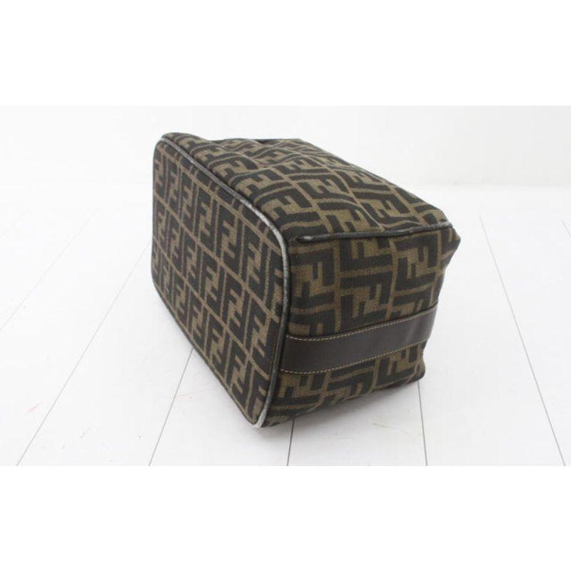Black Made from Zucca printed canvas, it features a brown leather trim and a unique For Sale