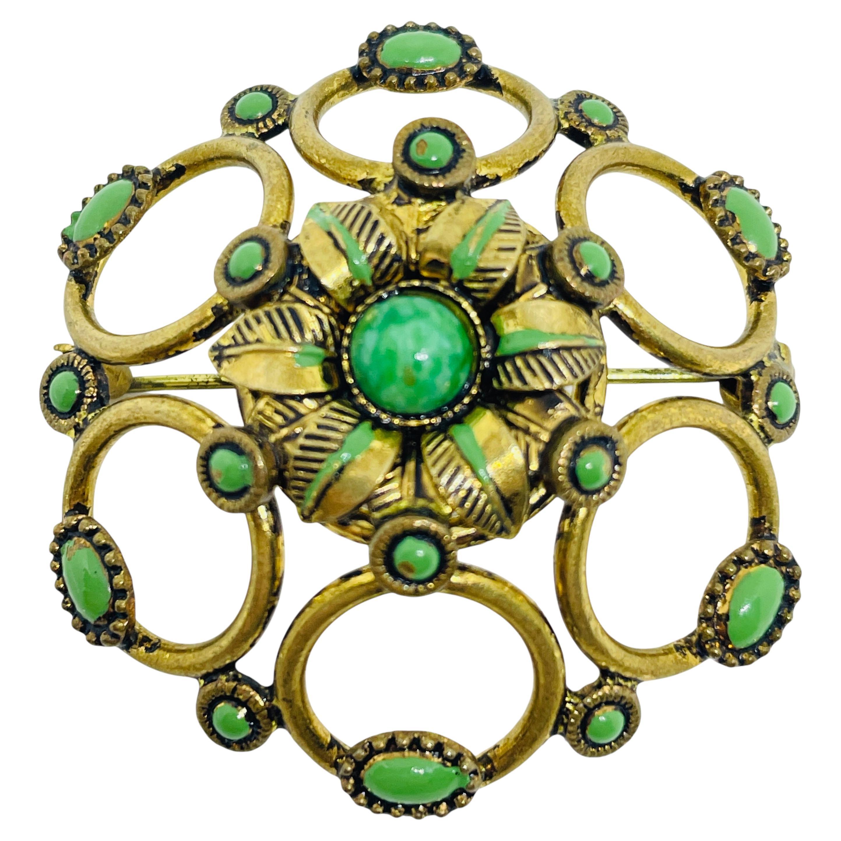 Spilla firmata MADE IN AUSTRIA con smalto color oro