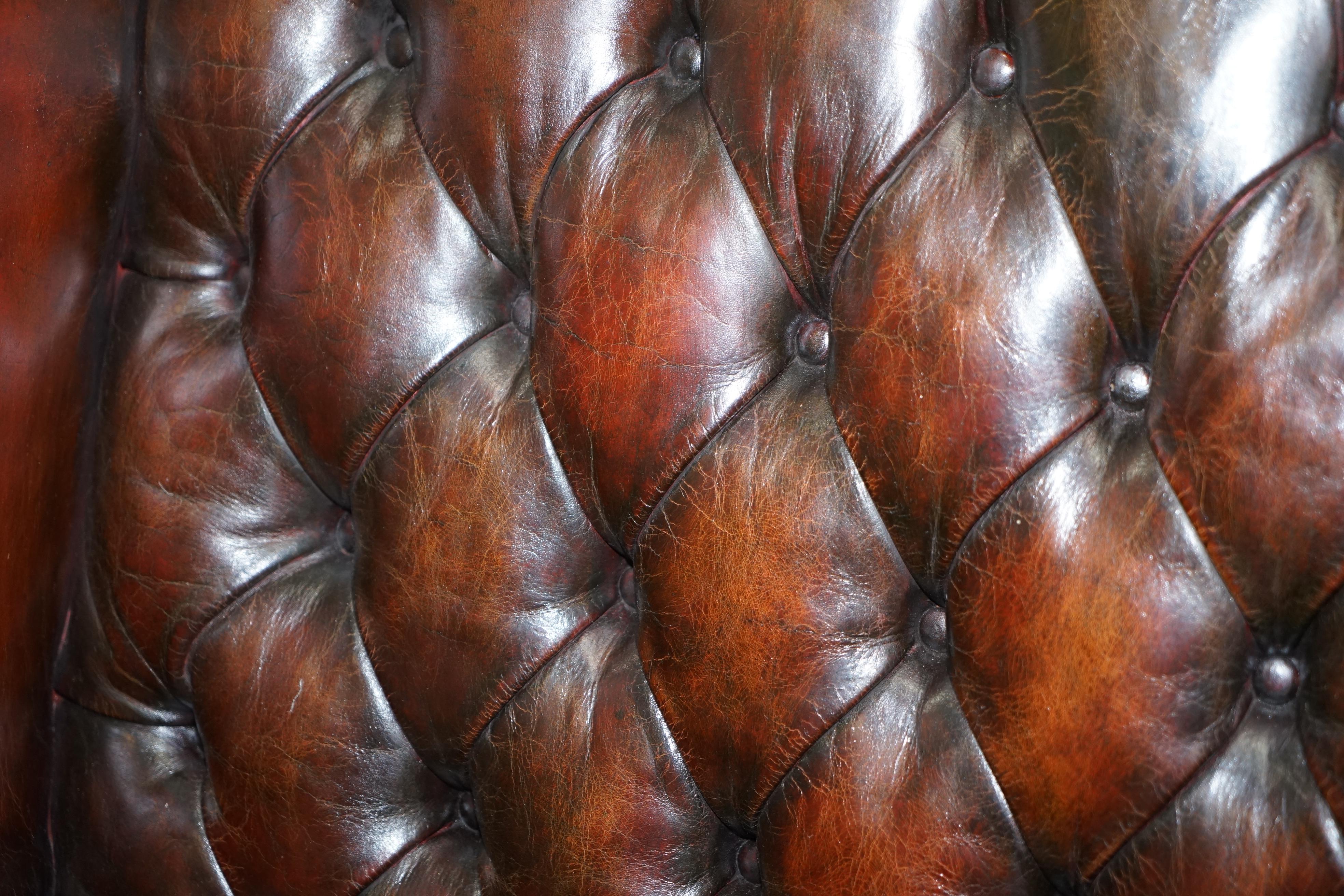 Mid-20th Century Made in England Chesterfield Leather Wingback Claw & Ball Armchair and Footstool