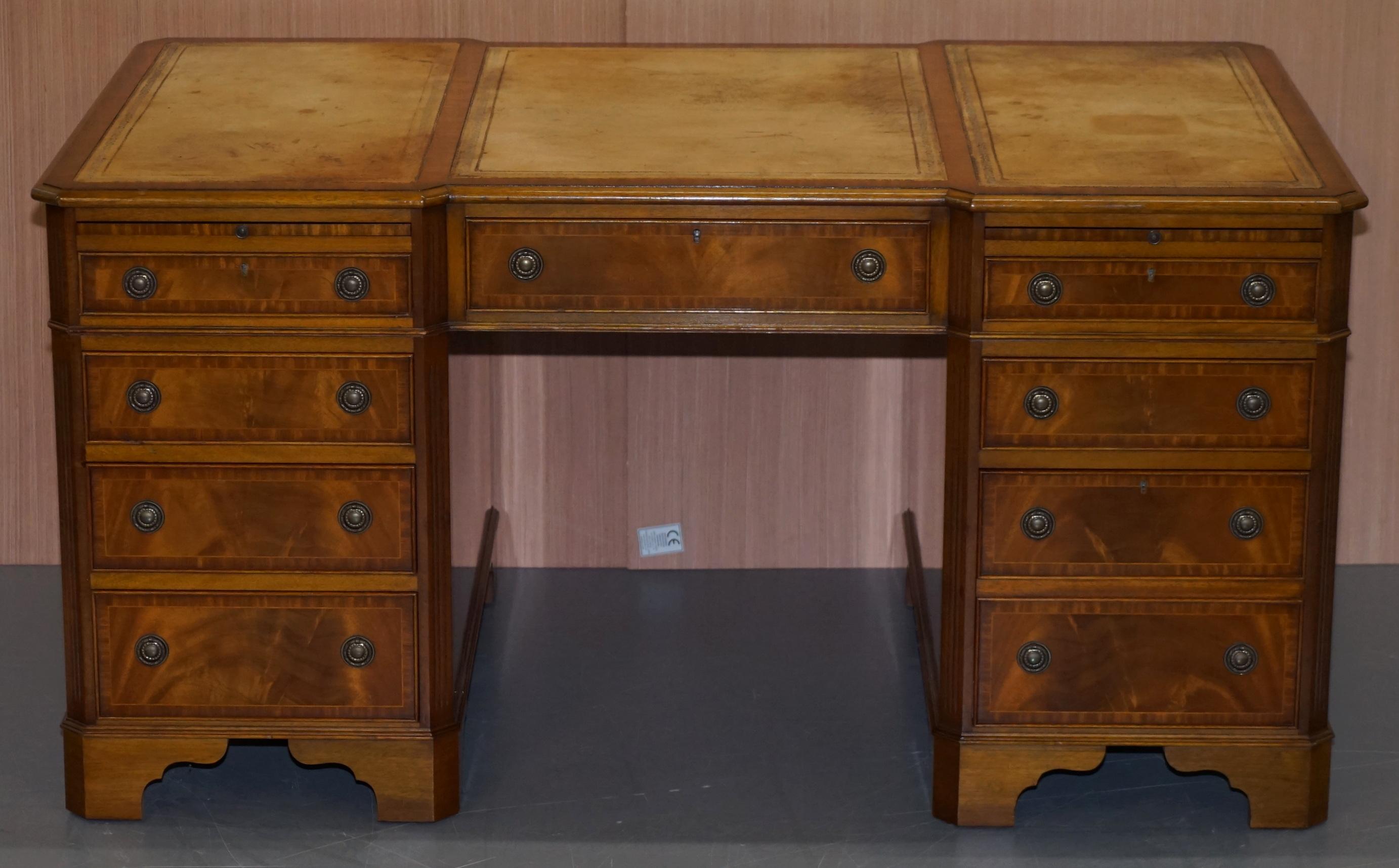 We are delighted to offer for sale this exceptional reverse breakfront twin pedestal partner desk hand made in England by the skilled craftsman at E.G Hudson

There are many companies out there making twin pedestal partner desks, they are all much