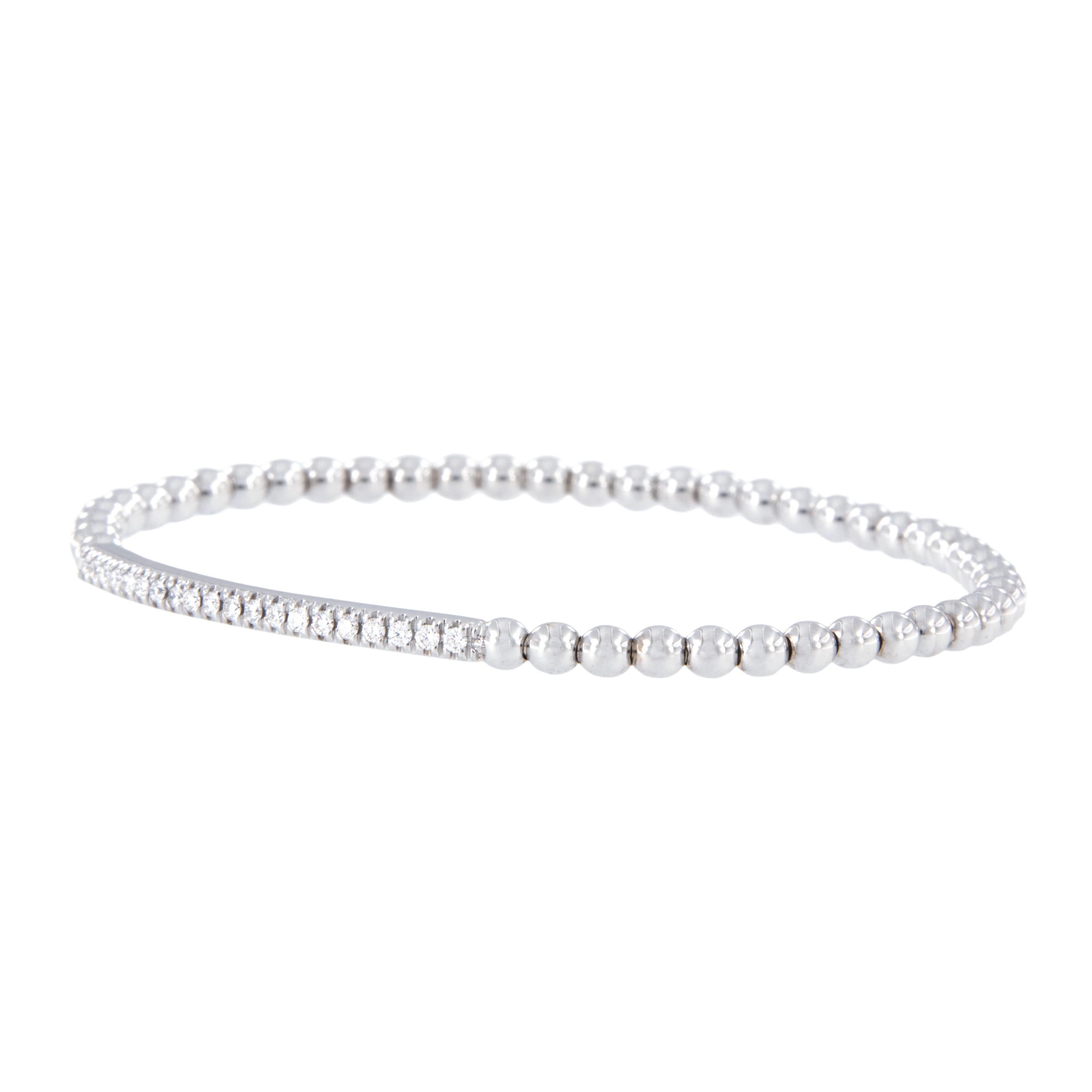 Known for their expert jewelry engineering, Italian craftsman specialize the stretch jewelry! This fun bracelet stretches to fit your wrist perfectly showcasing 0.26 Cttw of fine F_G VS diamonds across the top bar for a spectacular look! Can be worn