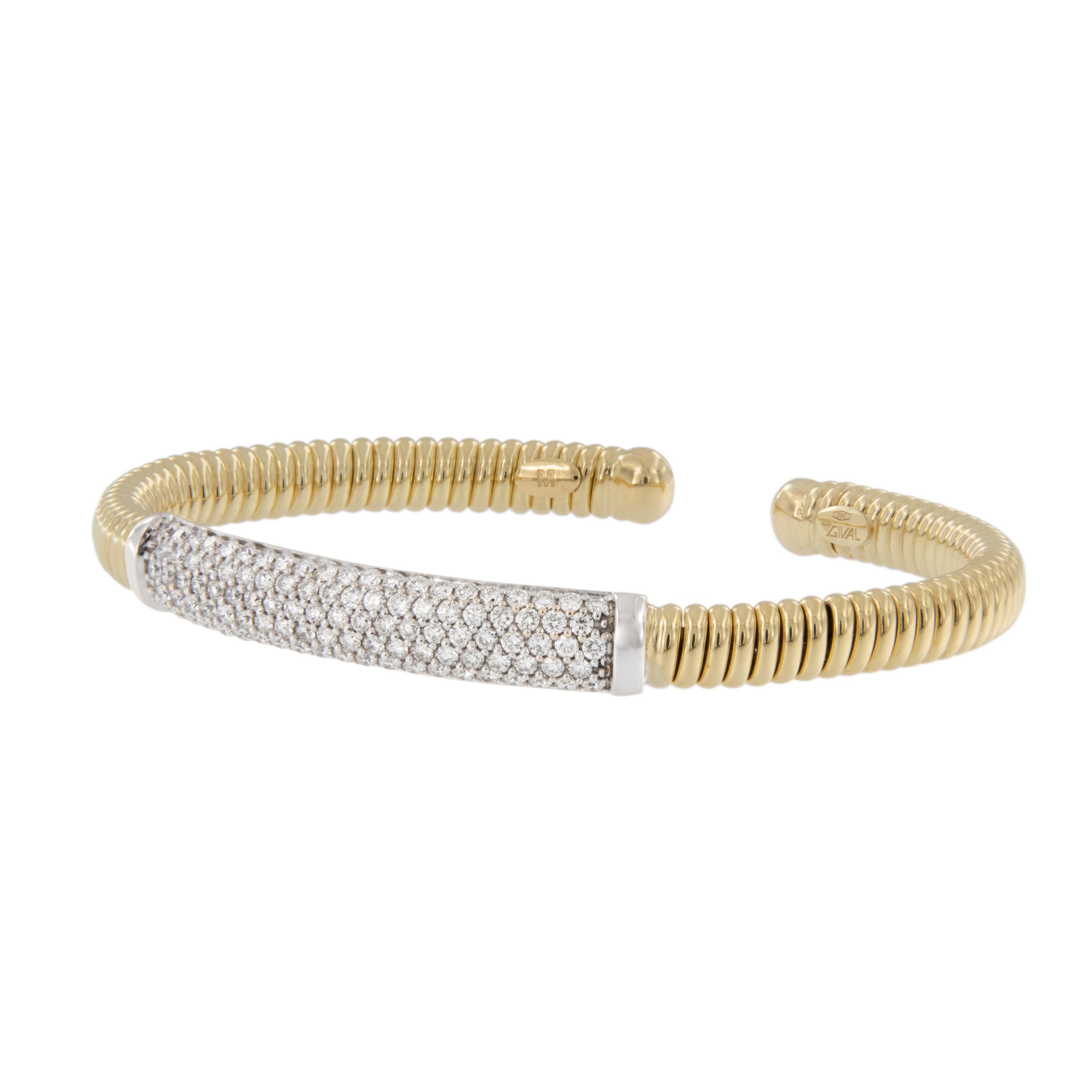 Italian jewelers, known for their fine craftwork created this rich 18 karat yellow gold flexible cuff bracelet with white gold center pave' section featuring 1.70 Cttw diamonds. Beautiful bracelet is so easy to slip on yet is secure on your wrist!