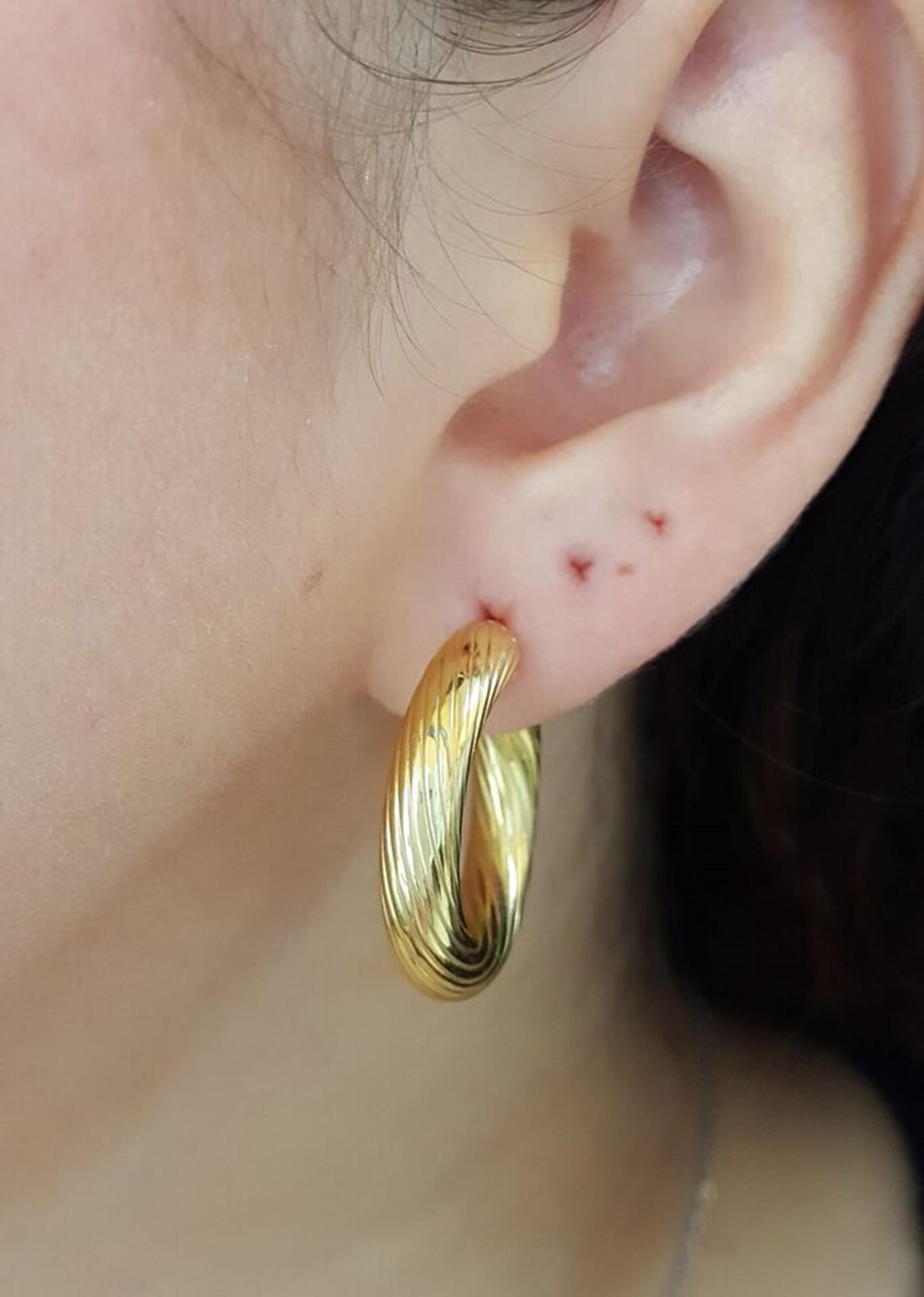 da uomo o donna Orecchini a cerchio tondi intrecciati in oro giallo 18 carati Made in Italy in vendita