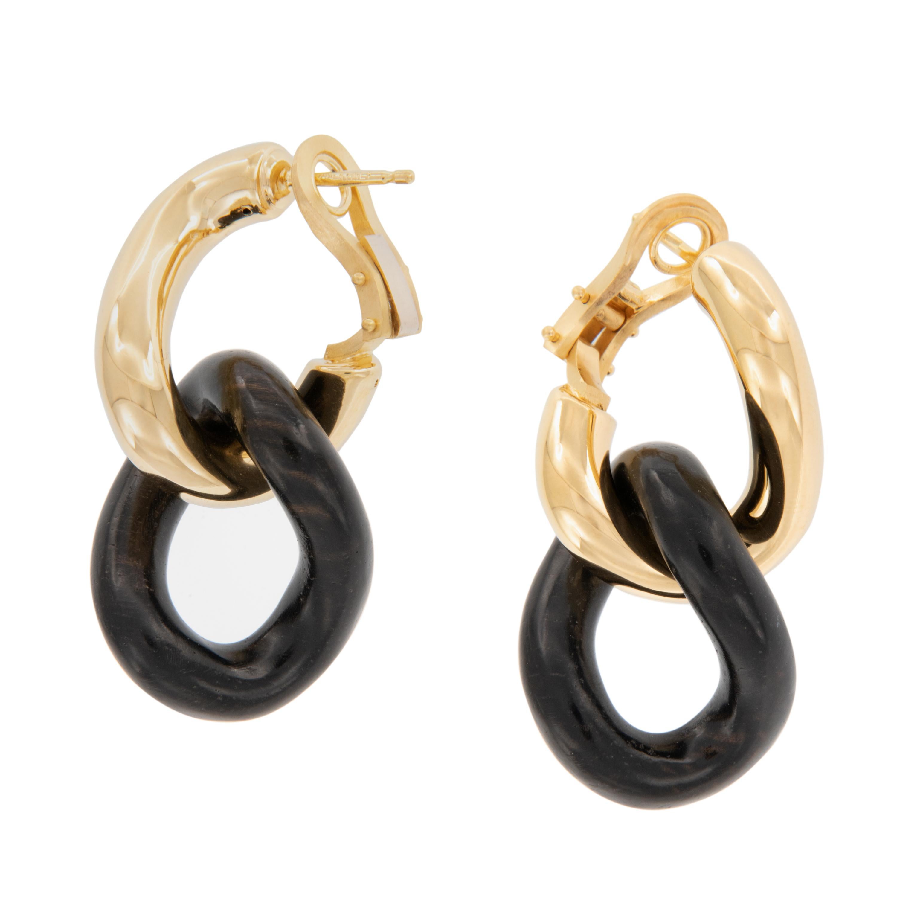 Elegant & timeless, these gorgeous, fine 18 karat yellow gold and ebony twist dangle earrings look fantastic with everything from the office to your little black dress! Ebony is a highly prized, ornamental wood, so dense that it takes a bright