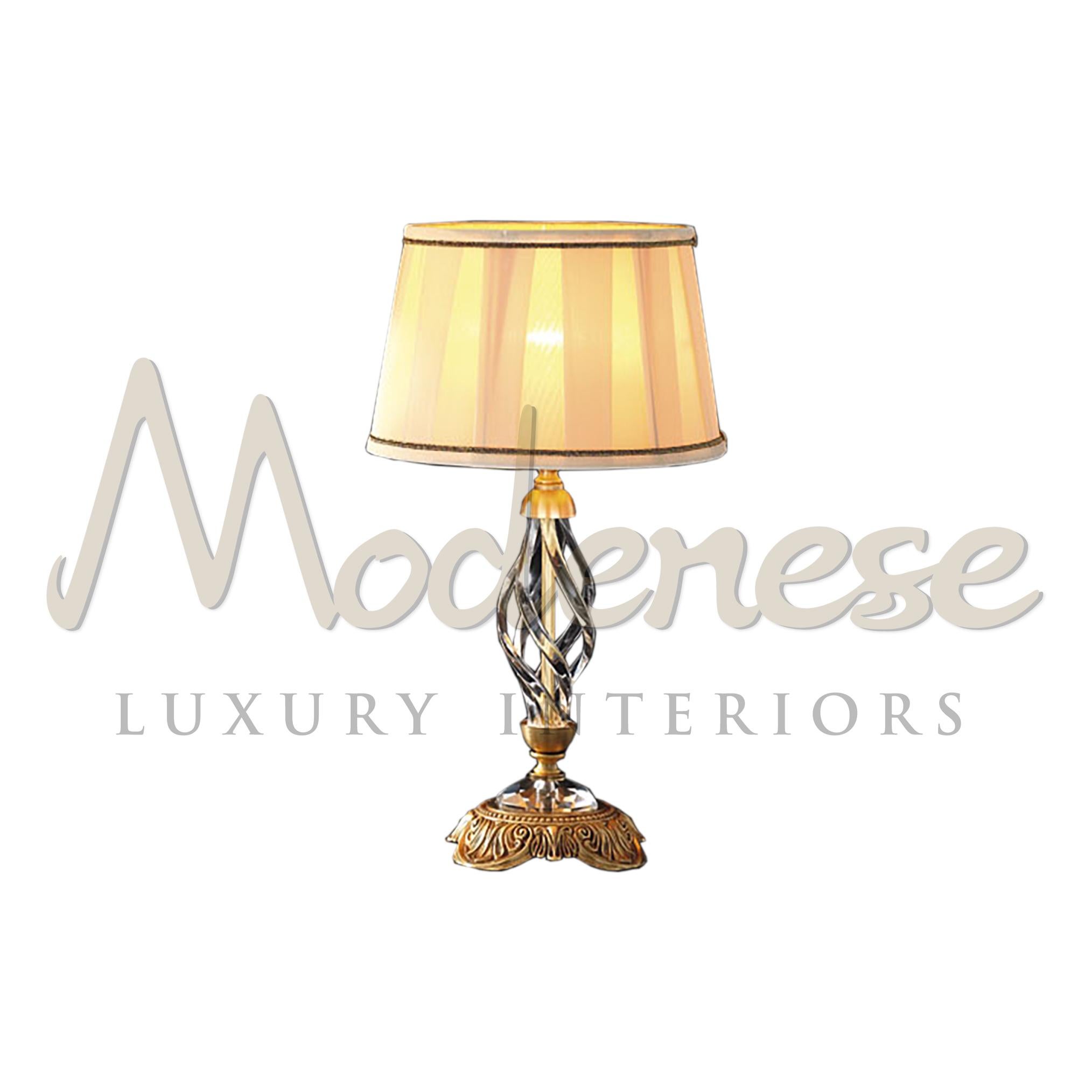 This peculiar gold table light will help you transform any room, enhance a classic style interior or add a unique accent to a fusion space with its metal finish in satin gold and transparent crystals, all customized by Modenese Luxury Interiors.