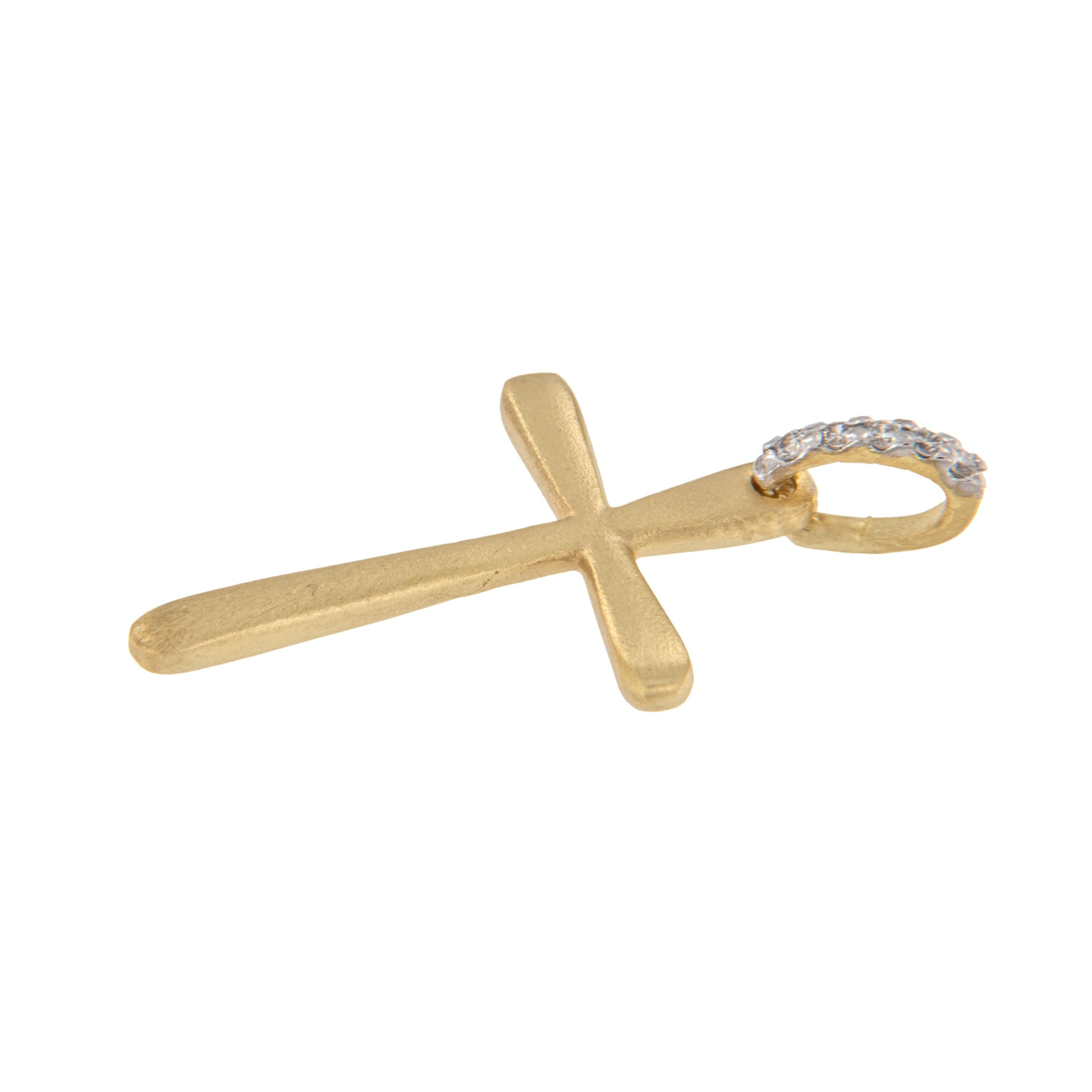 This made in Jerusalem cross is beautifully crafted from solid 18 karat yellow gold with a unique matte finish accented with 5 diamonds - 0.015 Cttw in bail for a beautiful look. Can be worn on a chain around your neck or cab be worn as a charm on a