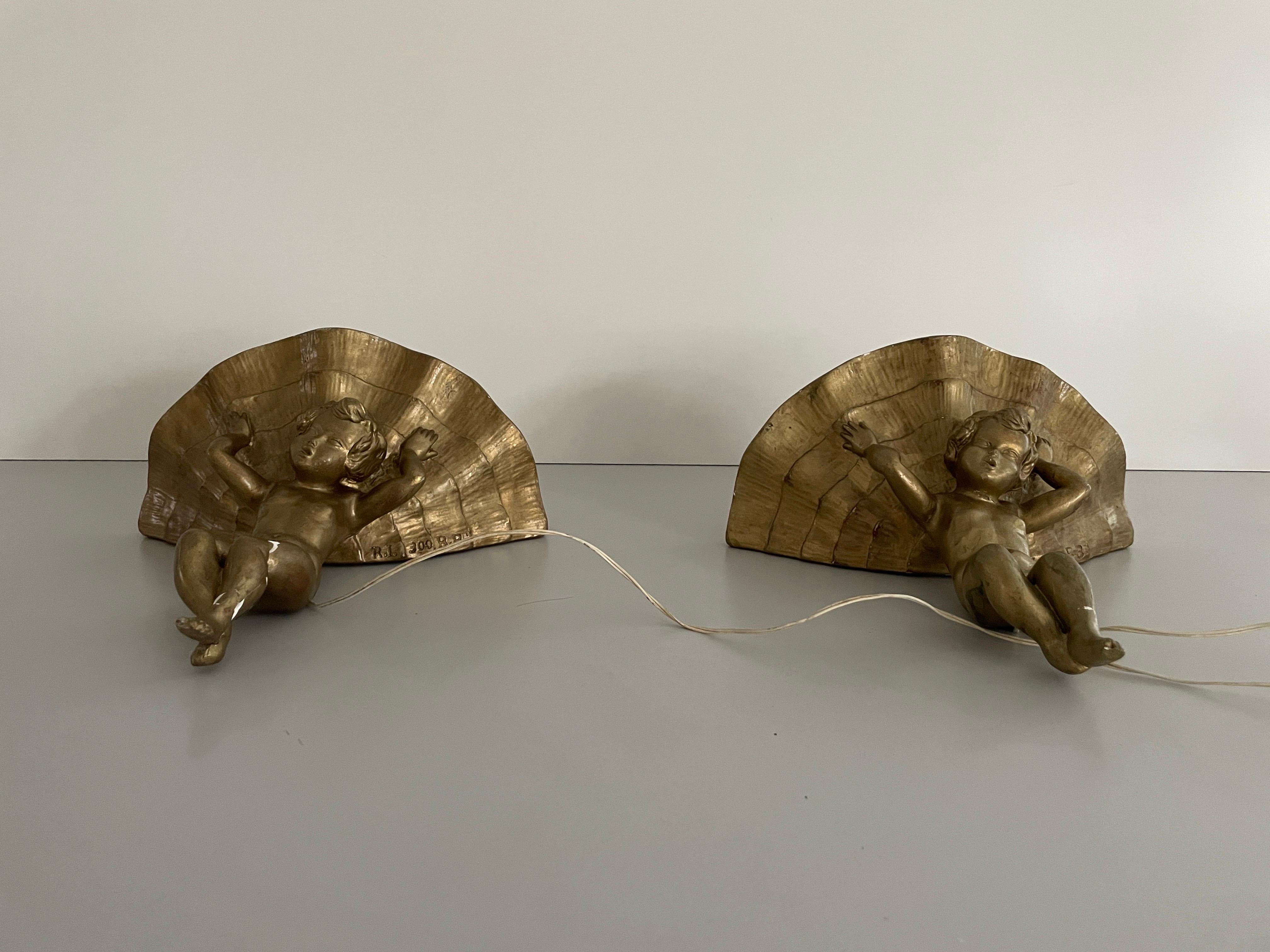 Italian Made of Plaster Gold Coloured Pair of Sconces in Angel Sculpture, 1960s, Italy For Sale