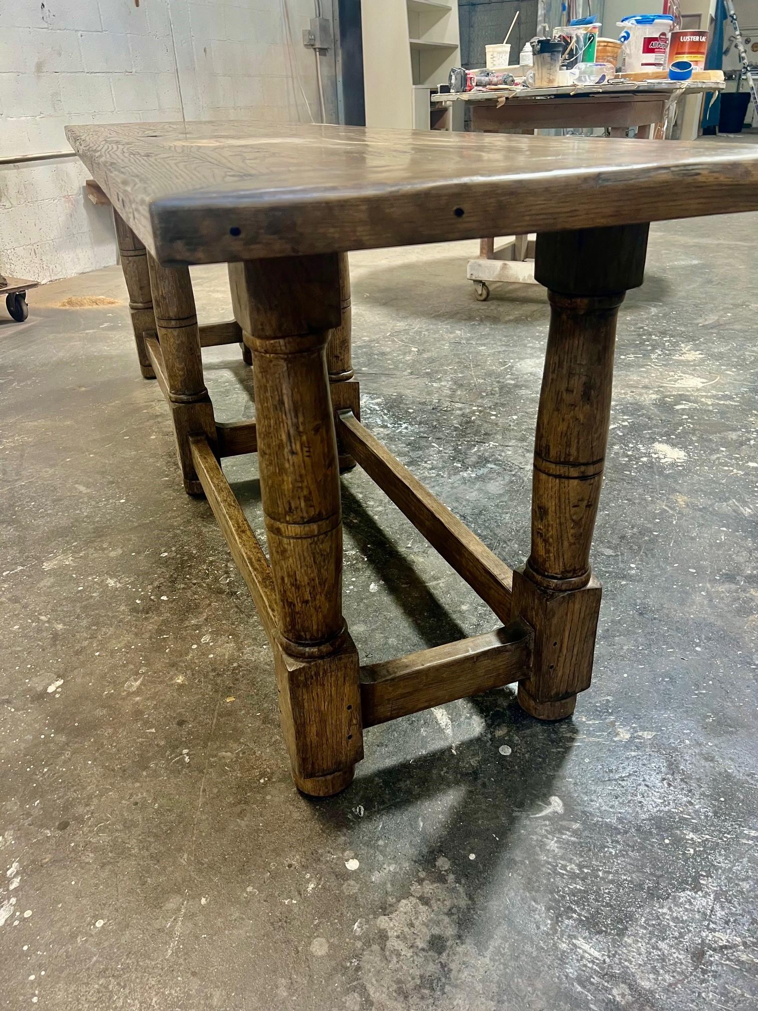 Made to Order Heavily Distressed and Antiqued Finish in Ashen Oak, Double Columns Turned Legs at each End and in the Middle, there is Solid Timber Brace running underneath perfect for resting feet, 2