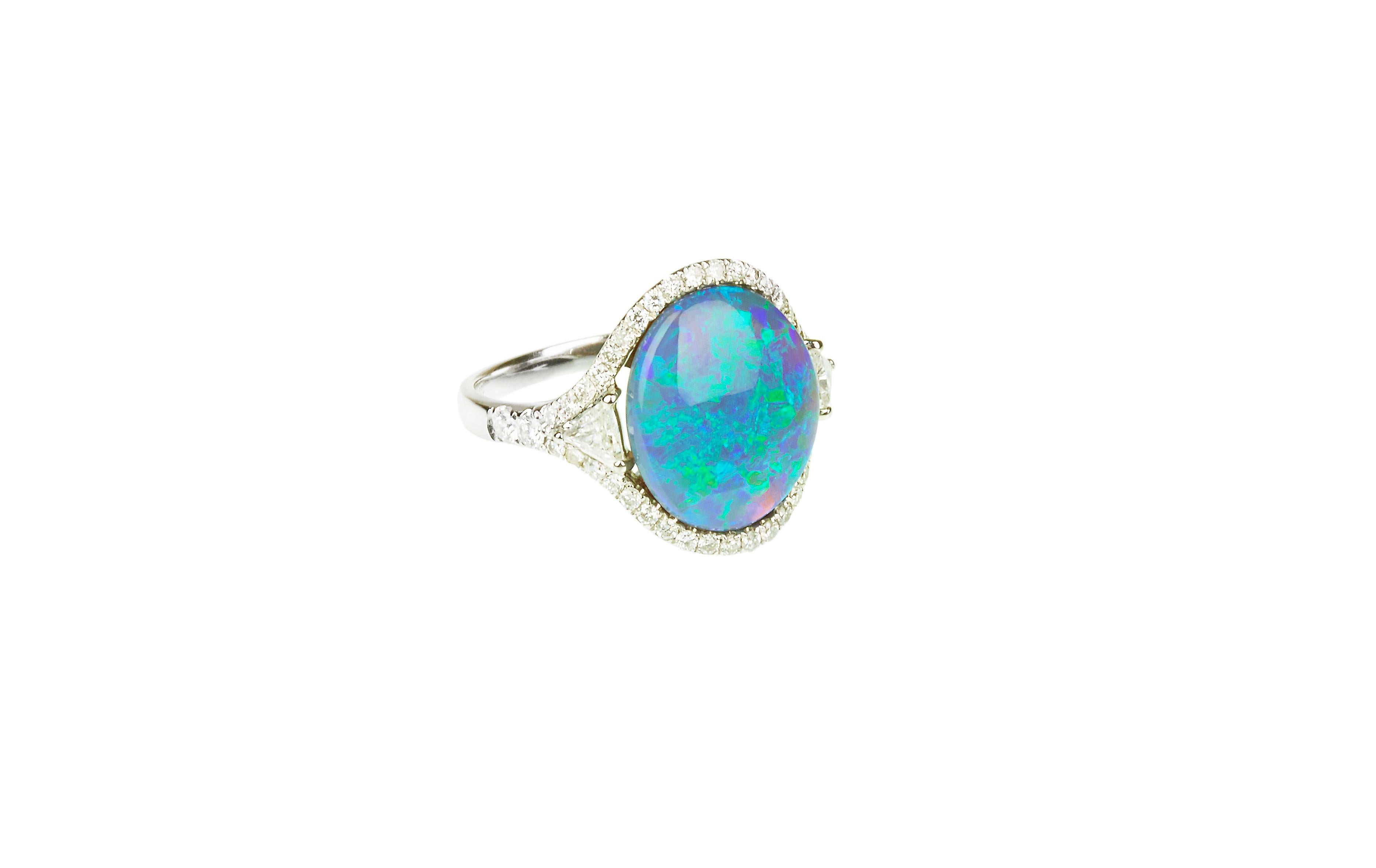 This one of a kind ring is from Lingjun's earlier creation, featuring a solid black opal from Lightning Ridge, Australia, accent with white diamonds.
IMPORTANT: Each ring is made to order, due to opal's variability, the centre gemstone's colour,