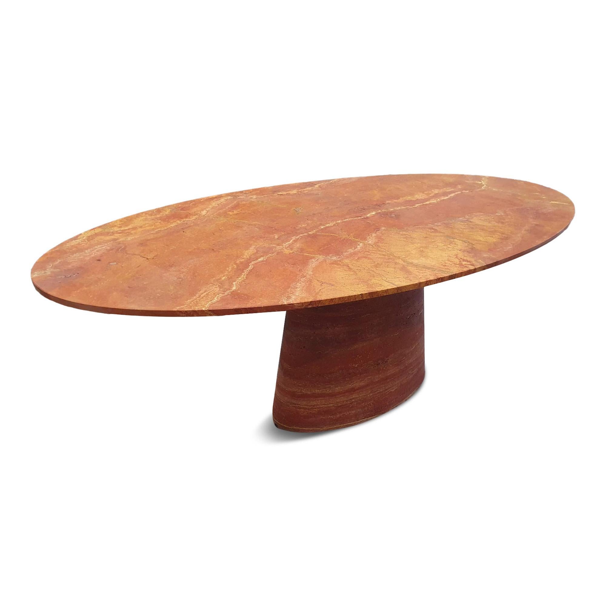 Dining table

Made to order in Italy

Red travertine

Oval top

Tapering oval shaped column base

Size can be customised

Contemporary.