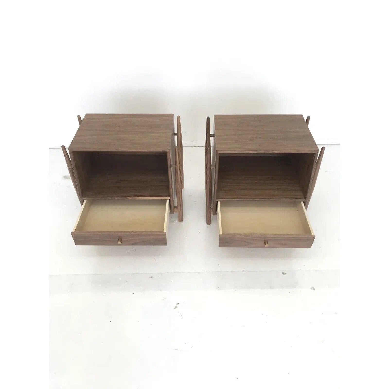 Contemporary pair of nightstands in the style of Kipp Stewart, handcrafted in solid and walnut veneer. This pair shows extraordinary craftsmanship, stunning walnut grain, and a clean and minimal design.

surface space w21 d15
drawer w18.25