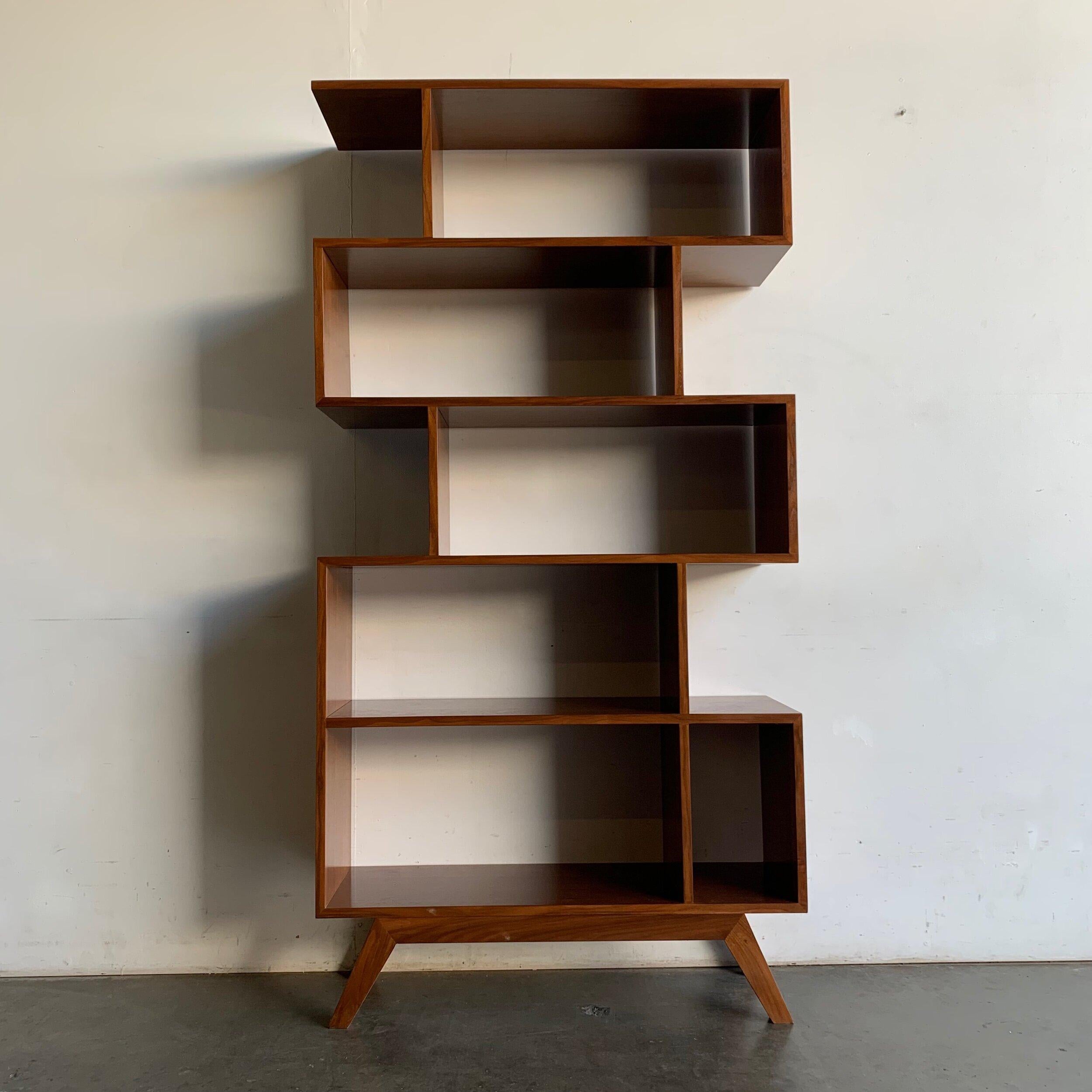 W36 D12.25 H70.25

Handcrafted solid and walnut veneer five tiered bookcase. Item is newly made here in house, and is ready for pick up or delivery. For custom dimensions (surcharge) inquire directly.

Lead time 6-8months