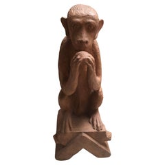 Sculpture de singe en pierre avec finition en terre cuite sur commande