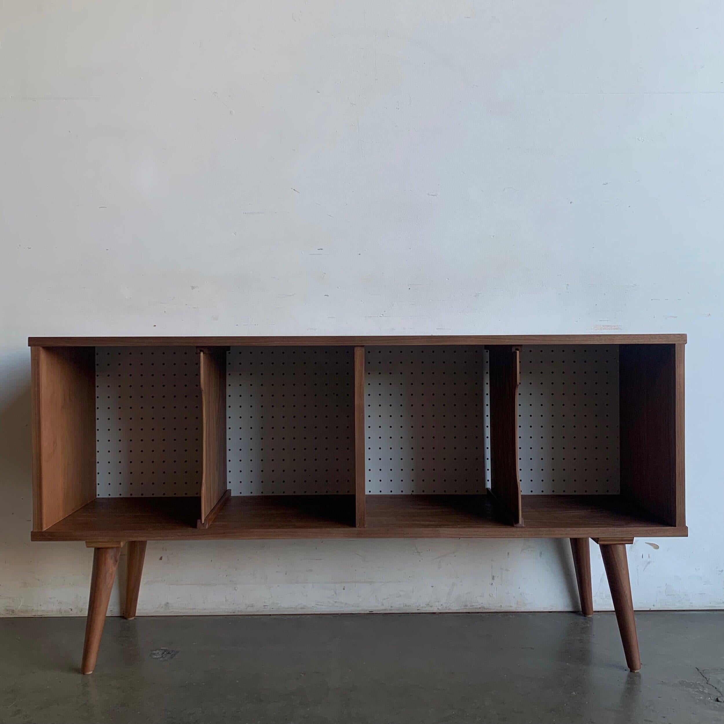 W50 D13.5 H26

This piece is custom made in house, item features removable center dividers and a white perforated backing.

This item is not currently available on the showroom floor but can be made available within 4-6 weeks after purchase in your