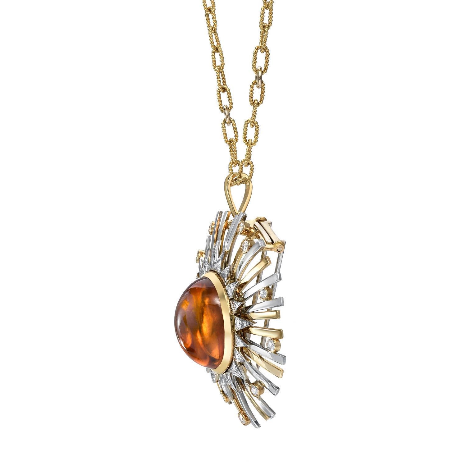 Exceptional 24.14 carat Madeira Citrine Cabochon, set in a state of the art, convertible pendant necklace and brooch, adorned by a total of 0.86 carats of diamonds.
Crafted by extremely skilled hands in 18K yellow and white gold.
Total length and