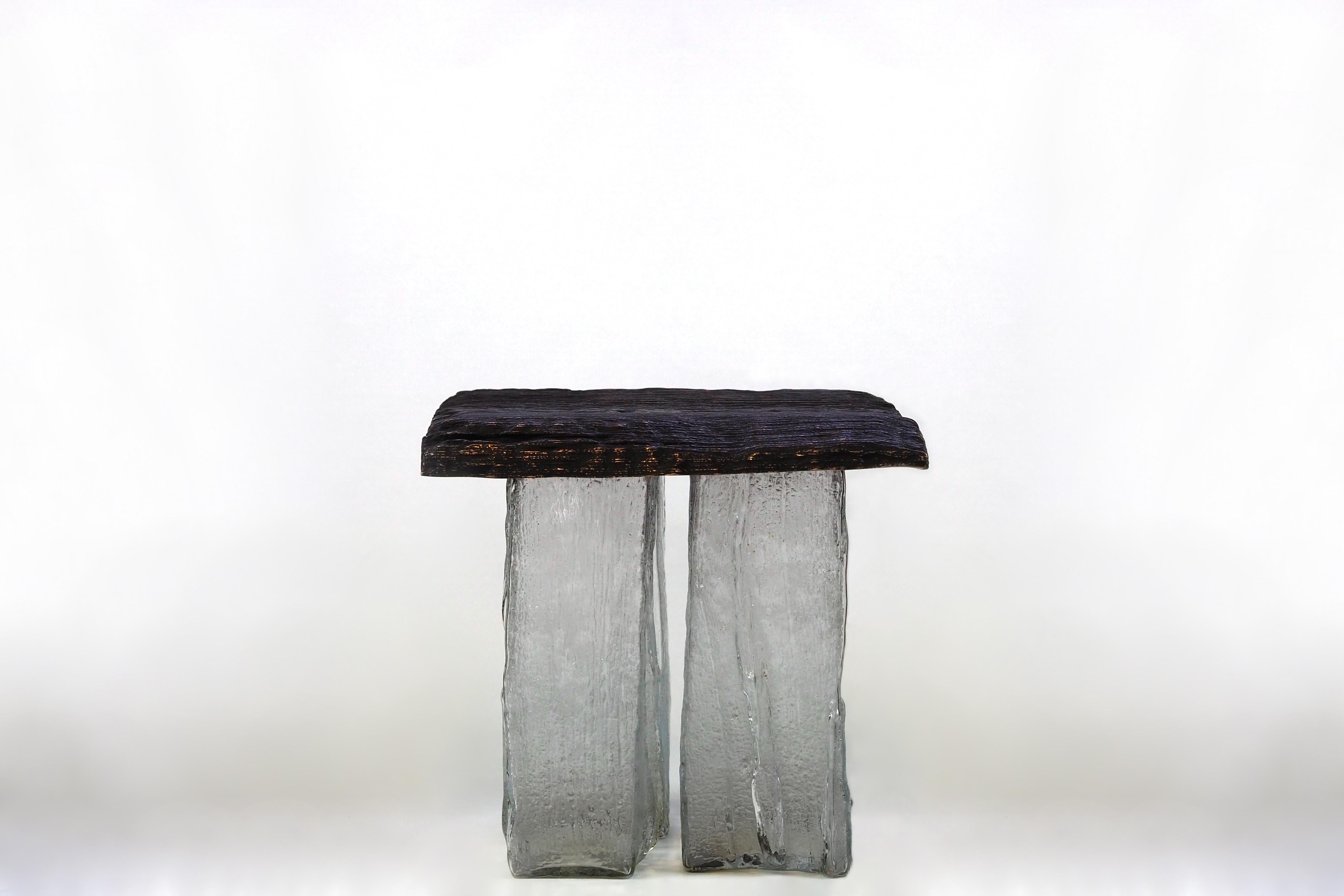 Madeira Table by Clément Thevenot
Limited Edition Of 12 Pieces.
Designed by Clément Thevenot and Joyce Broussillou.
Dimensions: D 50 x W 50 x H 45,5 cm.
Materials: Cast bronze, wood texture glass and resin fixing system.

Each copy is unique, has