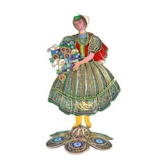 Vendedor de flores de Madeira en filigrana esmaltada sobre una base con círculos