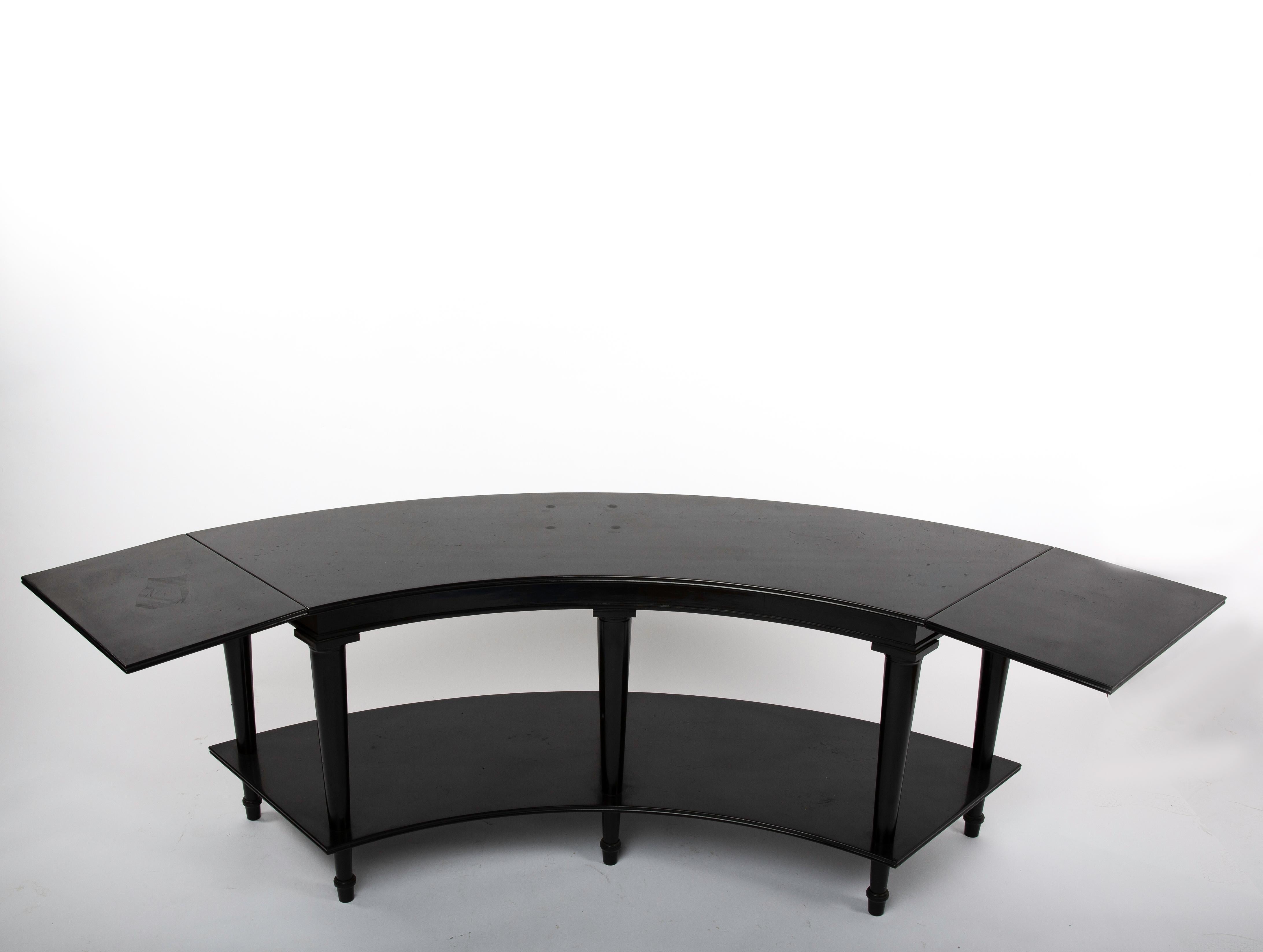 A beautiful and scarce pair of tables by Madeleine Castaing.
Lacquered wood, a low tray and a high tray. Both ends of high tray of each table are foldable.

These pair of tables are published in:

Adam Lewis, The Great Lady Decorators: The Women Who